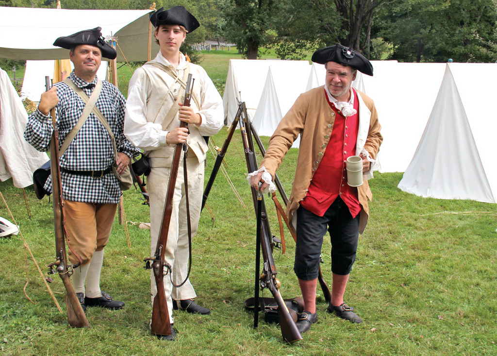 STEP BACK IN TIME: Joe Paluzzi, William English and Pete Giammarco show off their traditional Revolutionary War attire.
