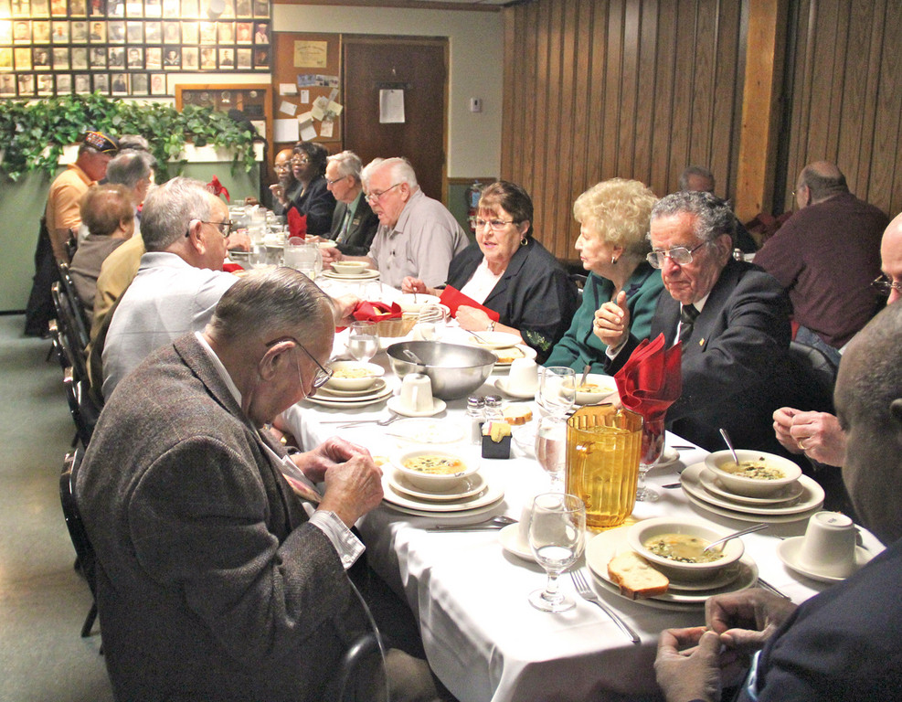 RAISING A TOAST: The Disabled American Veterans group held its installation of officers Saturday at the Kelly Gazzero Post on Plainfield Pike. For the past 80 years, the DAV has been dedicated to building better lives for America’s disabled veterans and their families. Pictured here, the DAV members and their guests dig in to a celebratory dinner.