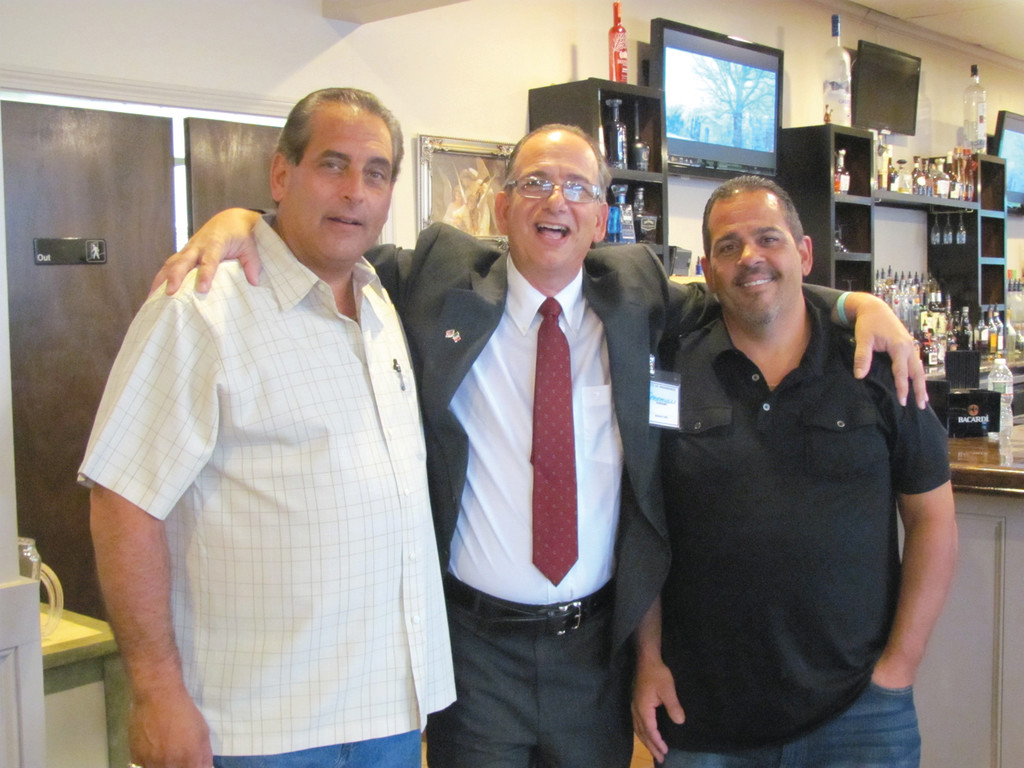 Louis J. Spremulli (center) enjoys a lighter moment during last Thursday’s Pannese Society fundraiser with Ciara Restaurant and Lounge owners Steven Catanzaro (left) and Michael Barone. The event was completely sold out.