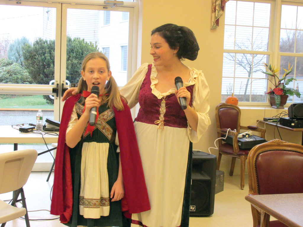 CHRISTMAS SHOW: Little Miss Riding Hood (played by Haley Pine, left) and her mother (Jamie Dellorco, right) will be he headliners Sunday in the Kaleidoscope Theater’s production of Little Miss Riding Good’s Christmas. Show time is 1 p.m.