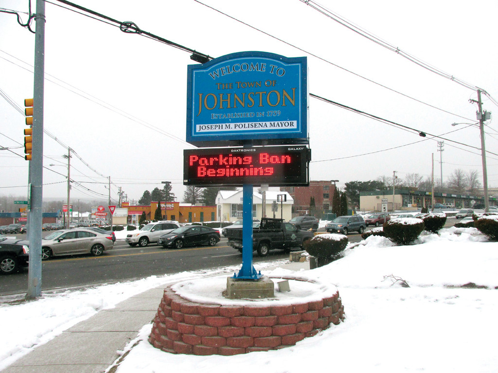 SNOWY SCENE: Johnston’s new welcome sign and message board are seen during a recent snowstorm.