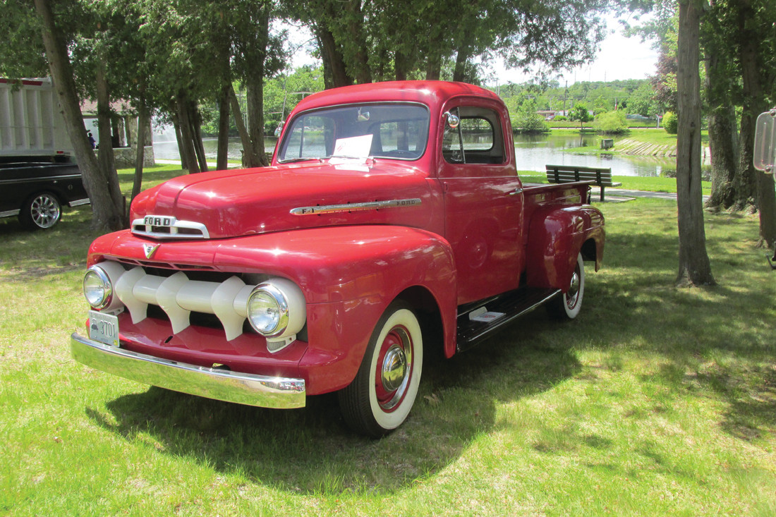 RED ROADSTER: This is a 1951 Ford pick-up truck that caught the eyes of young and old alike Sunday.