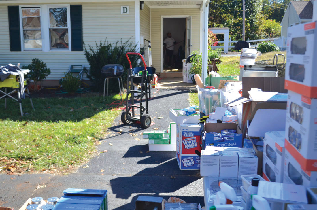 MUCH NEEDED SUPPLIES:  Stacks of home improvement materials dotted the landscape at Operation Stand Down’s property as volunteers tackled projects to improve the facilities (Photos by Michael Huber)