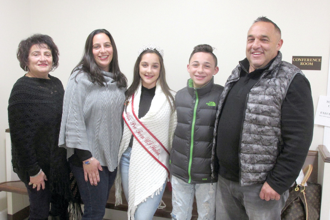 FAMILY FANS: The Johnston Town Council made Tuesday night, Nov. 11, special for the Salzillo family and honored Emma Salzillo (third left) for winning the prestigious Miss US Italia Pre-Teen title in Providence. (Sun Rise photo by Pete Fontaine)
