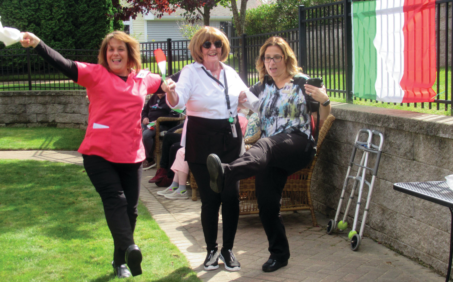 STRUTTING STAFFERS: There was so much fun during Tuesday’s Taste of Italy at Briarcliffe Manor even nursing director Joanna Matos, activities aide Mary Connors and assistant nursing director Deb Petronelli strutted their stuff for the applauding residents.