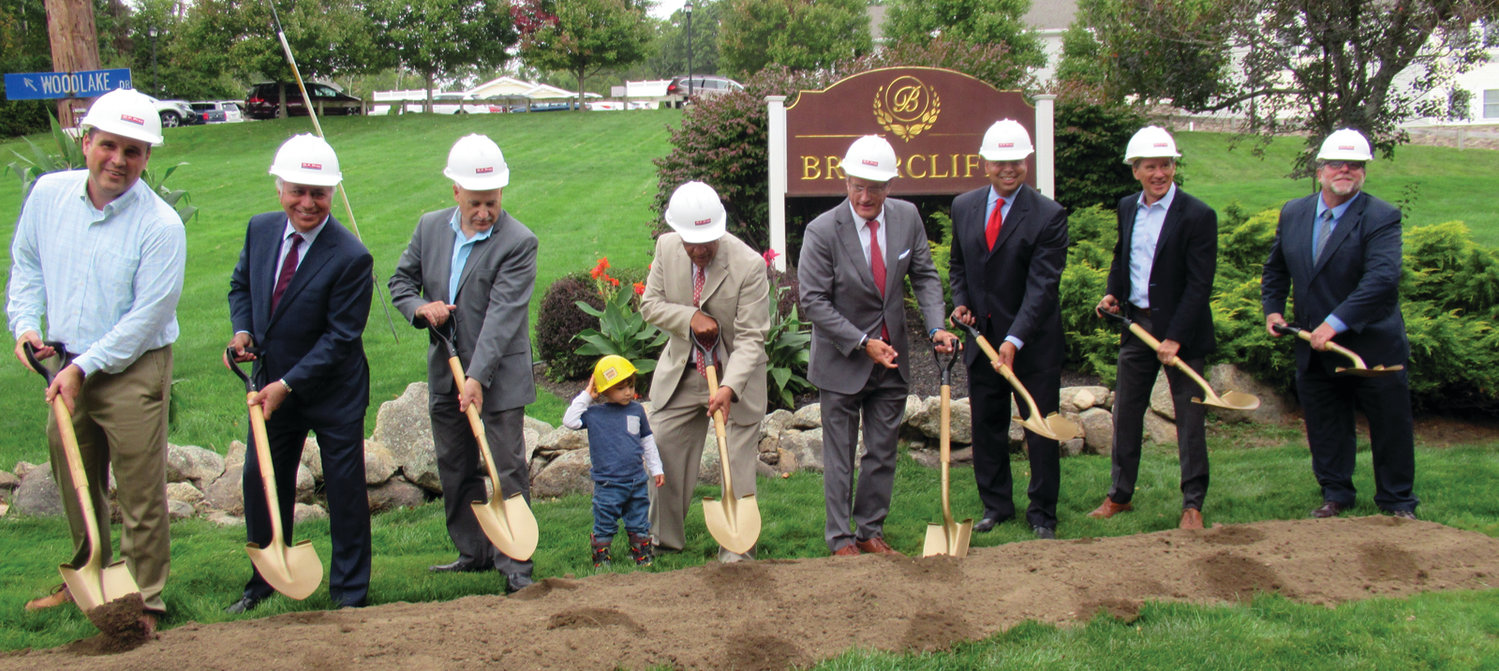HISTORIC HAPPENING: Among those people who helped break ground for Briarcliffe’s The Preserve are, from left, Kyle Naylor, Mehdi Khosrovani, Mayor Joseph Polisena, Benjamin Day and his grandfather Akshay K. Talwar, Scott Pray, Manny Barrows, Dennis DiPrete and Ron Laprise.