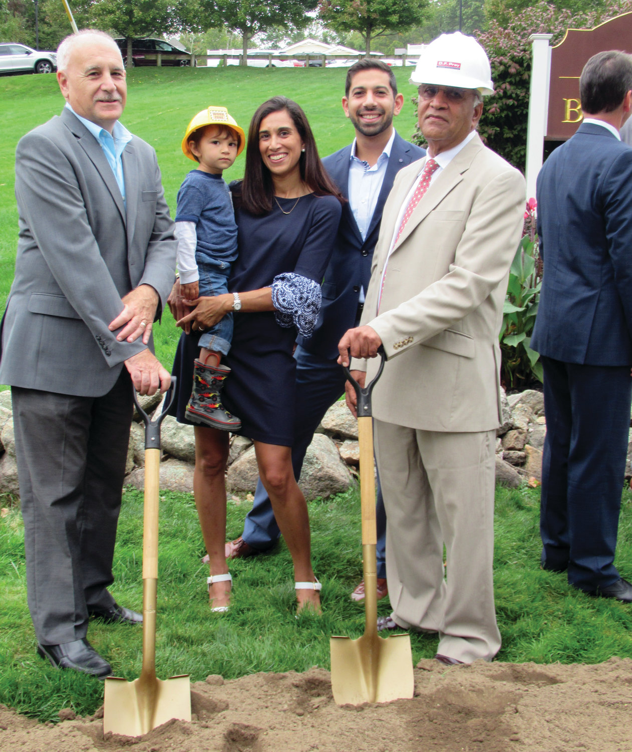 DELIGHTFUL DUTY: Mayor Joseph Polisena joins Akshay K. Talwar, CEO and president of the Briarcliffe Campus, and his grandson Benjamin Day, daughter Nisha Talwar and son Anand Talwar during last Wednesday’s event.