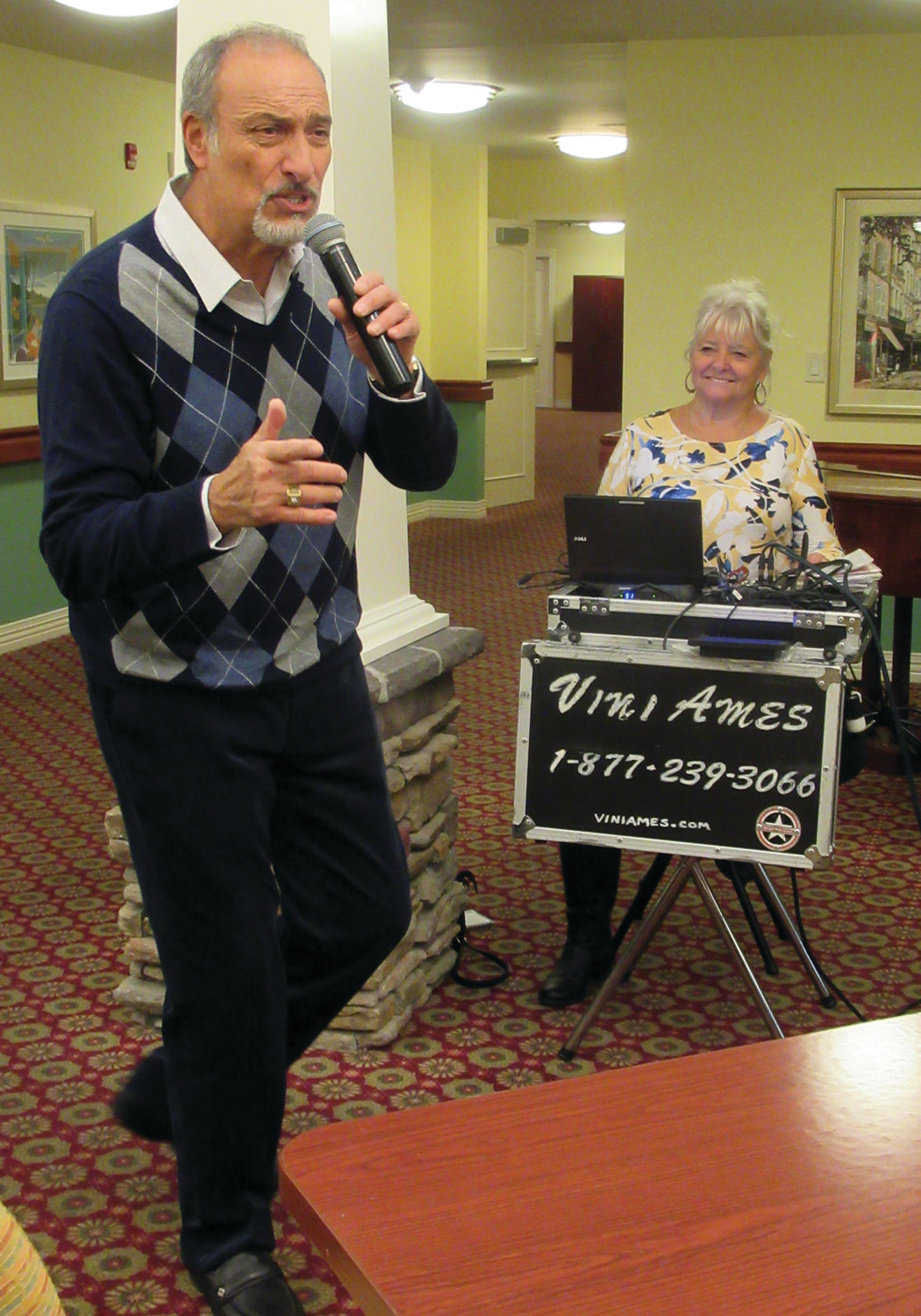 MIGHTY MUSIC: Vini Ames sings one his many old-time favorites – Frank Sinatra’s “Summer Wind” – during the annual black Friday Party at Briarcliffe Gardens.