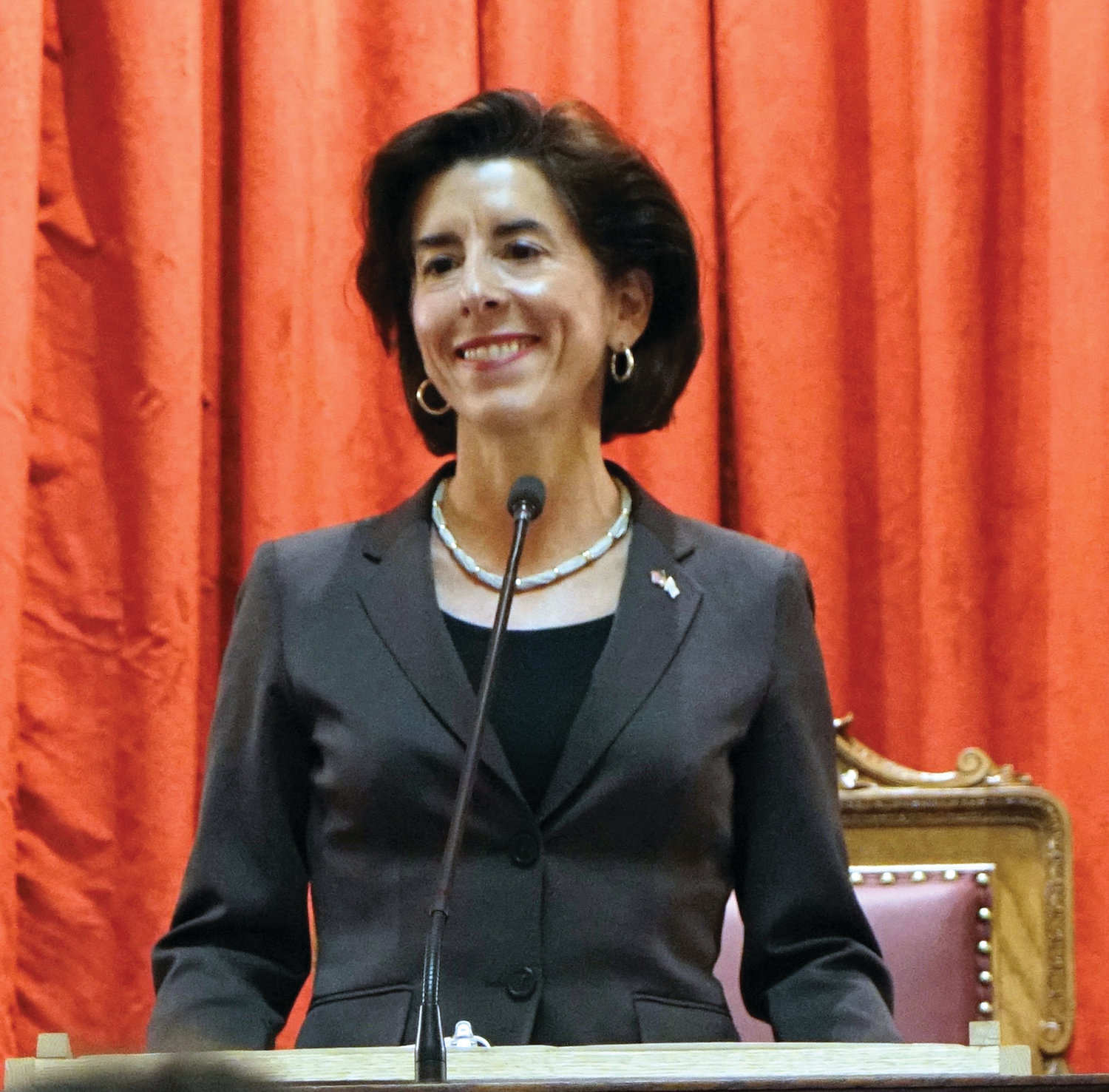 FOCUSED ON ‘BIGGEST CHALLENGES’: Gov. Gina Raimondo delivers her sixth State of the State address in the House chamber at the State House on Tuesday night.