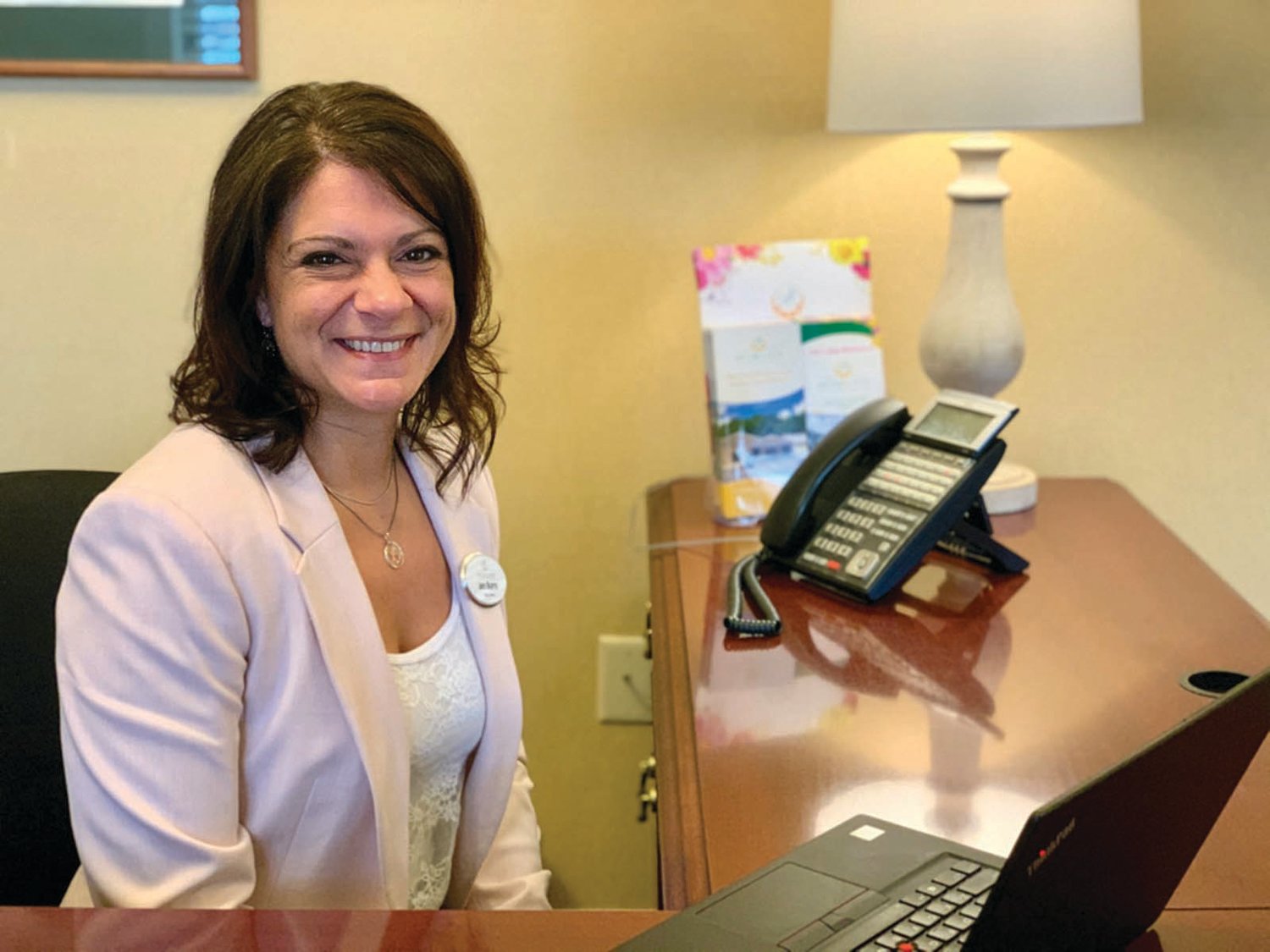 SUPER SMILE: Johnston native Jen Burns, who is highly-respected in the long-term care industry as well as throughout the community, is excited about taking on the challenge as sales director at ultra-modern independent and assisting living facility that will be known as the Preserve.