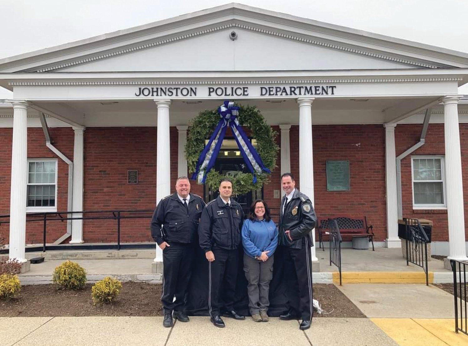 GENEROUS WREATH: Johnston Police have shared a photo of the station’s newest holiday decoration. “Our sincere thanks to Connie and Dino Jacavone of Jacavone Garden Center for decking our station with a beautiful holiday wreath,” Johnston Police wrote on their Facebook page. “We appreciate the support!”