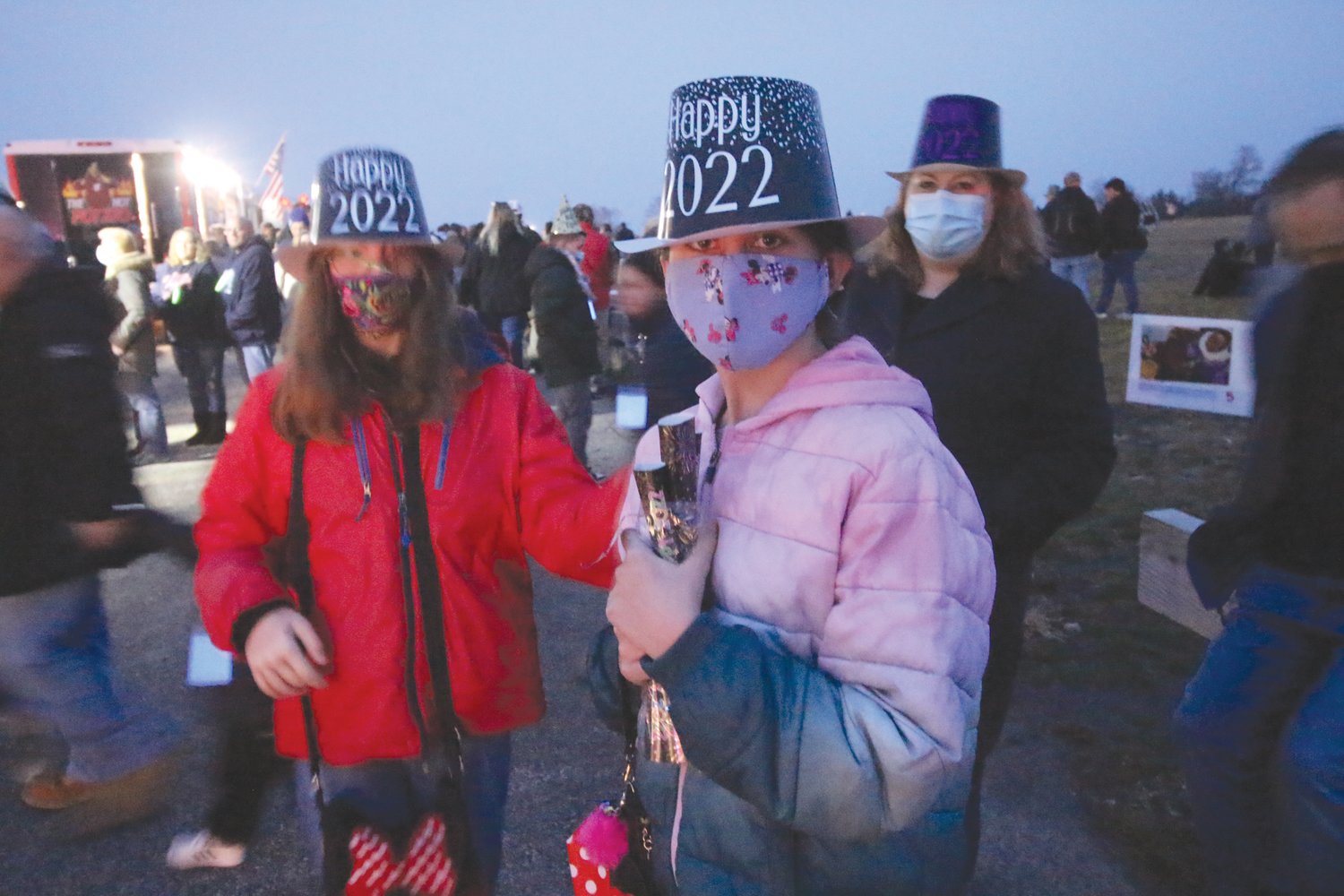 HATS ON FOR 2022: Revelers came appropriately attired for the occasion.