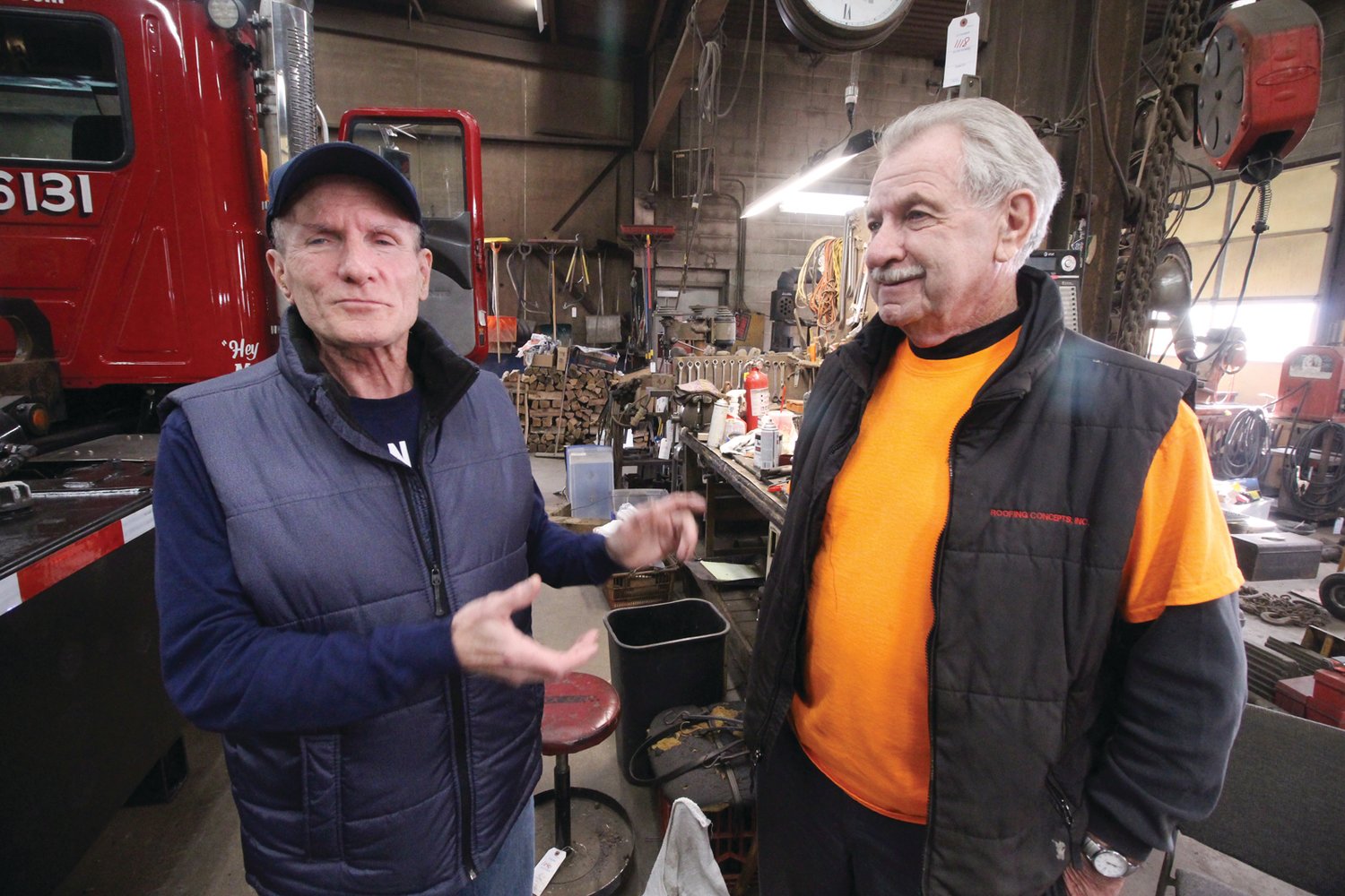 FRIENDLY VISIT:  Jim Walsh (left) stopped by the business to say hi to Butch Guevremont. Walsh, among other family, employees and customers was instrumental in the company’s start up.