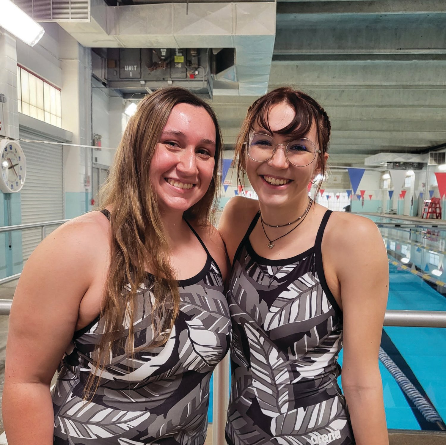 Pilgrim girls
swim seniors Kaylee
Collins (left) and Kara Lee
take a photo together during
the team’s recent Senior
Night meet.