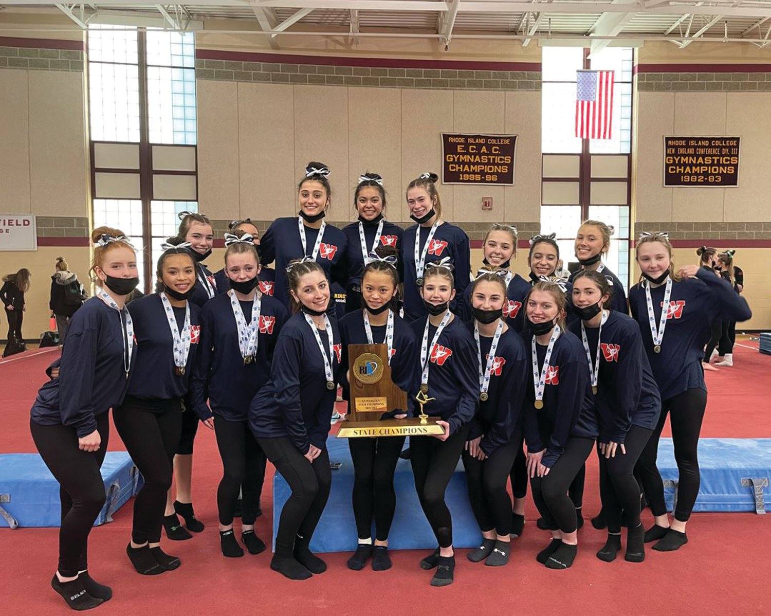 STATE CHAMPS: The Warwick gymnastics co-op after winning the Division I title last Sunday.