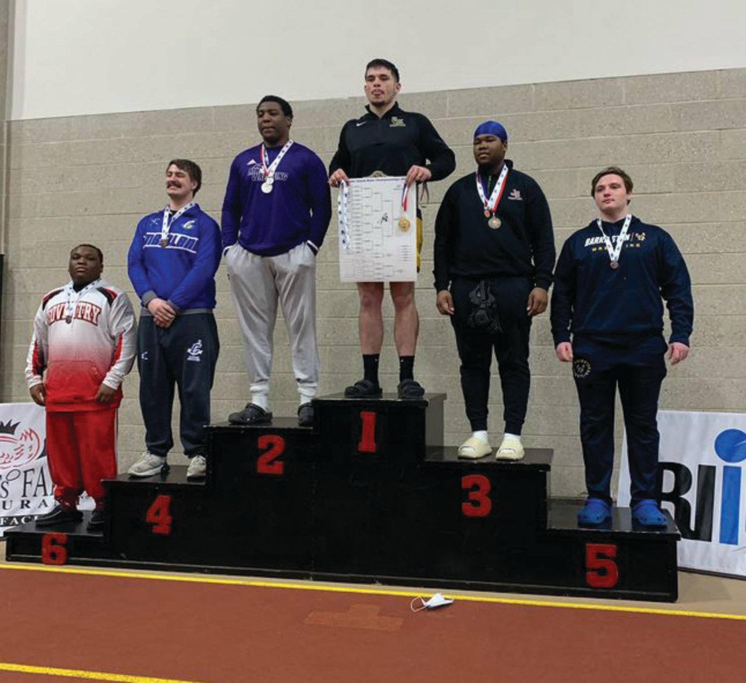 TOP OF THE PODIUM: Spencer Fine takes first place at 170 pounds.