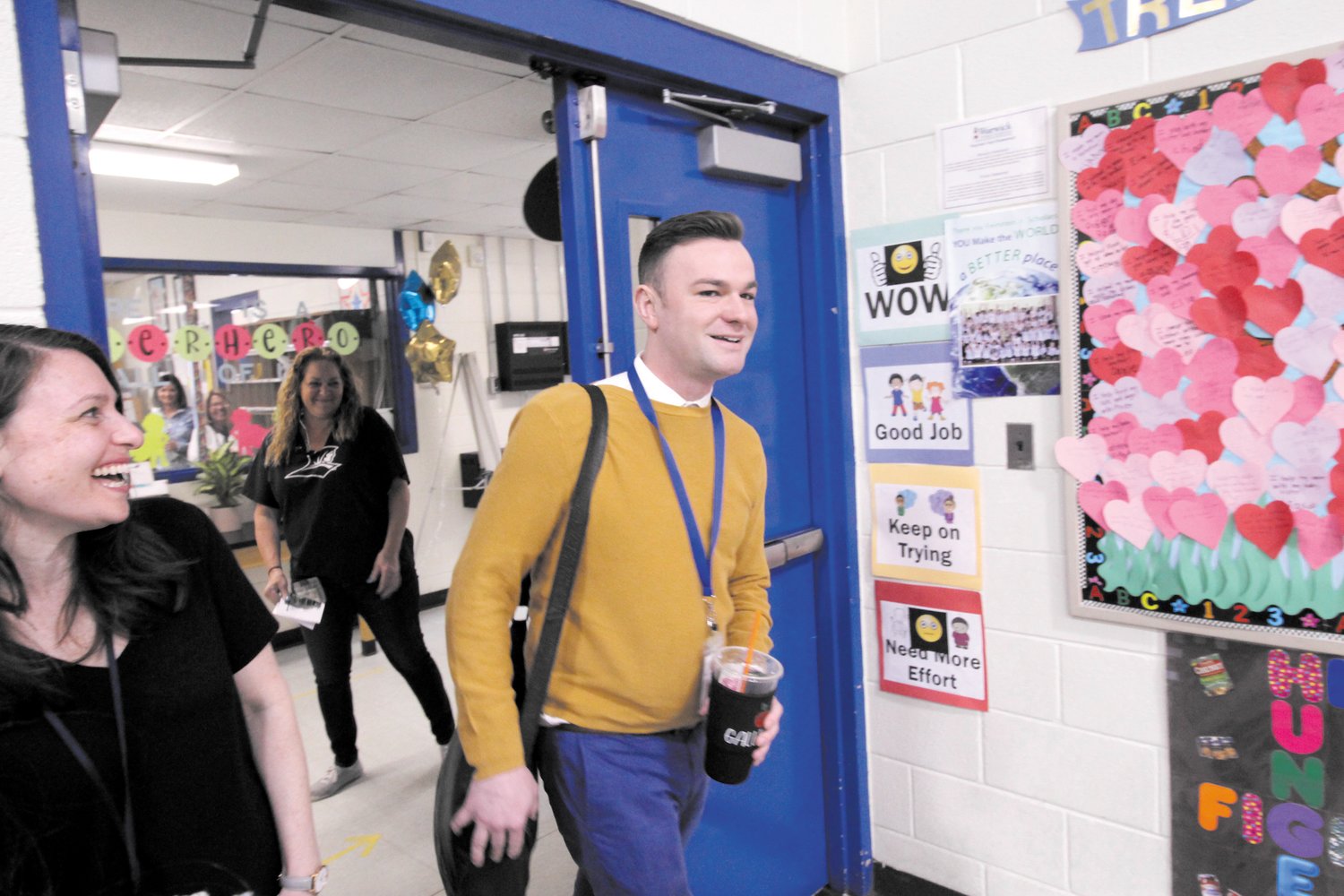 PICKED AS THE BEST:  With Galligan looking on, Robert Littlefield ,  director of  the Rhode Island Association of School Principals  told of the rigorous review that went into naming the state’s Outsanding First Principal of the Year.