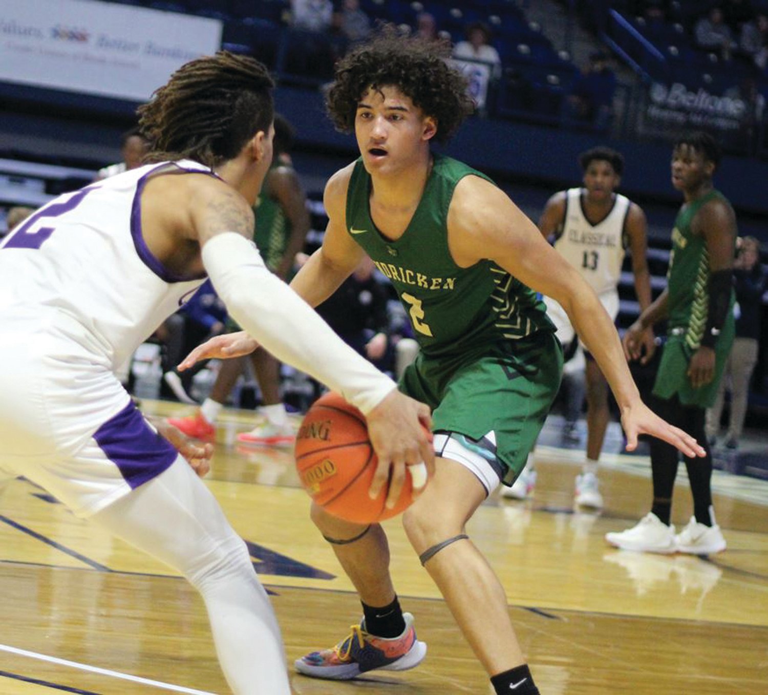 CHAMPIONSHIP PERFORMANCE: Bishop Hendricken’s Cam Chinn plays defense against Classical in the Division I State Championship game at the Ryan Center at URI last week (left).  (right).