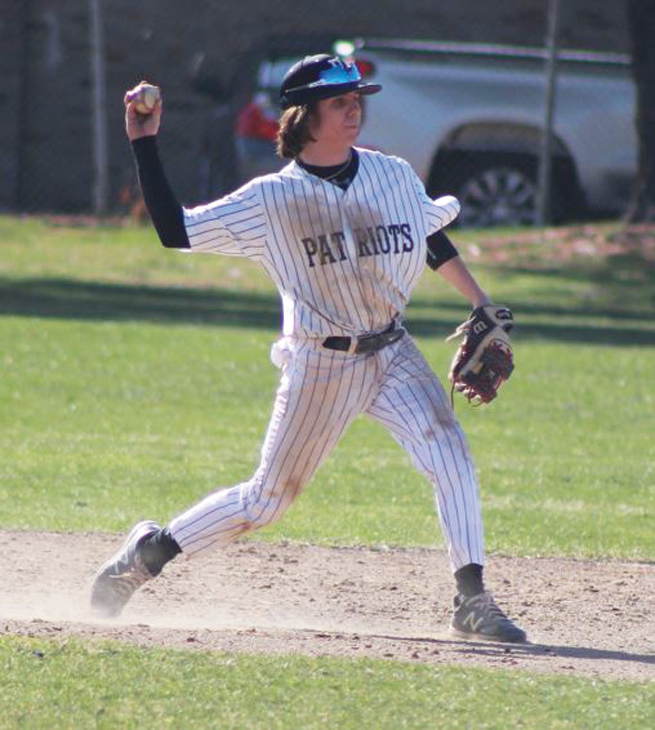 THE THROW TO FIRST: Pilgrim’s Dylan Bourret makes a play to first on Monday.
