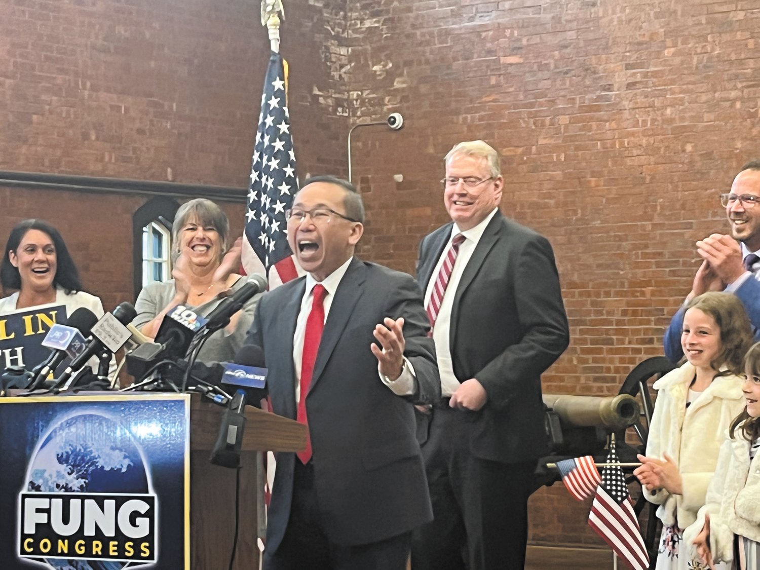 SHOUT OUT FOR CONGRESS: Flanked by Cranston City Councilors Nicole Renzulli and Matt Reilly former Cranston Mayor Allan Fung officially kicked off his campaign for Congress on Tuesday afternoon at the Varnum Memorial Armory in East Greenwich.  Fung is set to face off against Bob Lancia in the Republican Primary.  (Warwick Beacon photo)