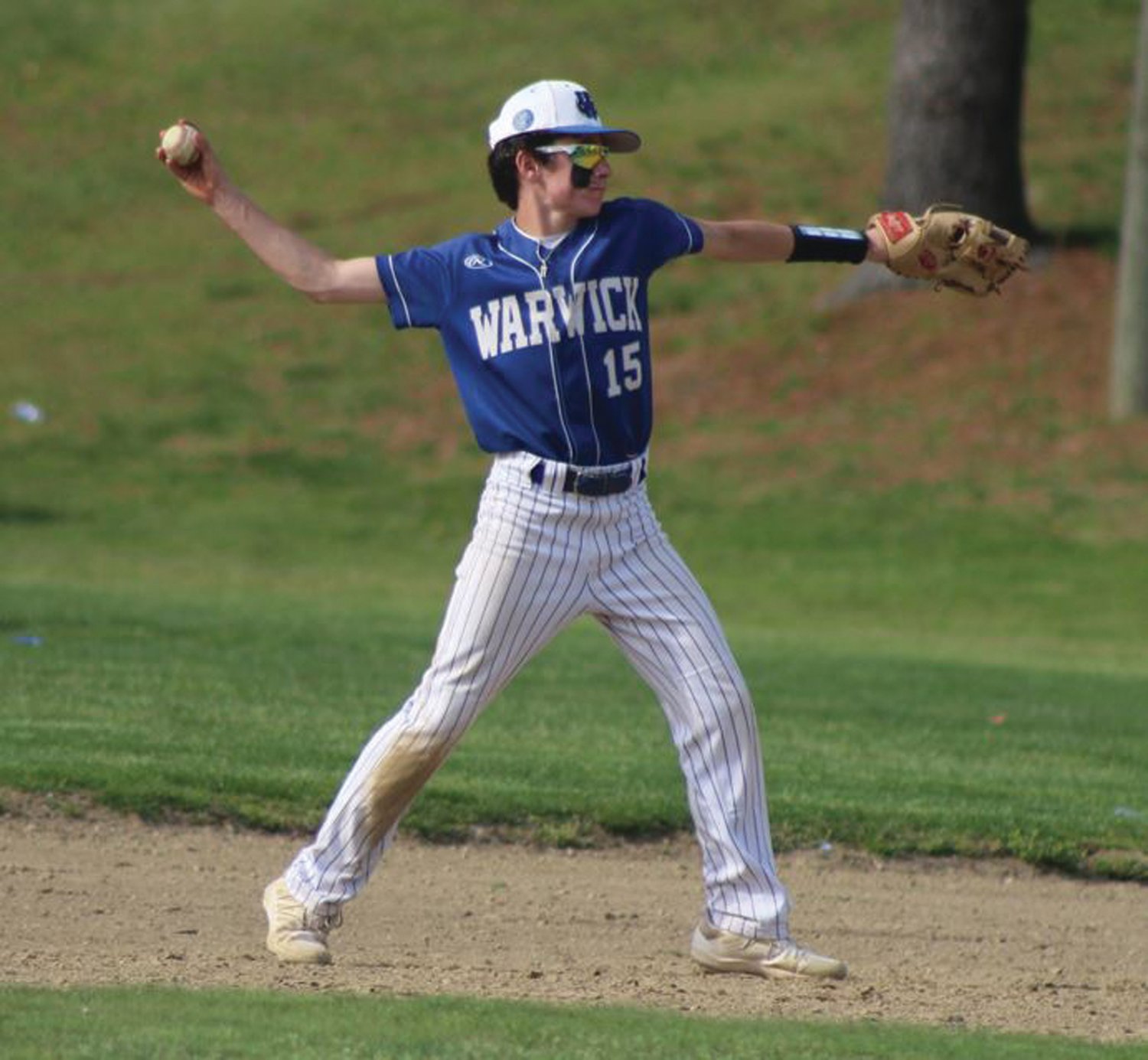 AROUND THE HORN: Vets’ Michael Bryson makes a throw to first.
