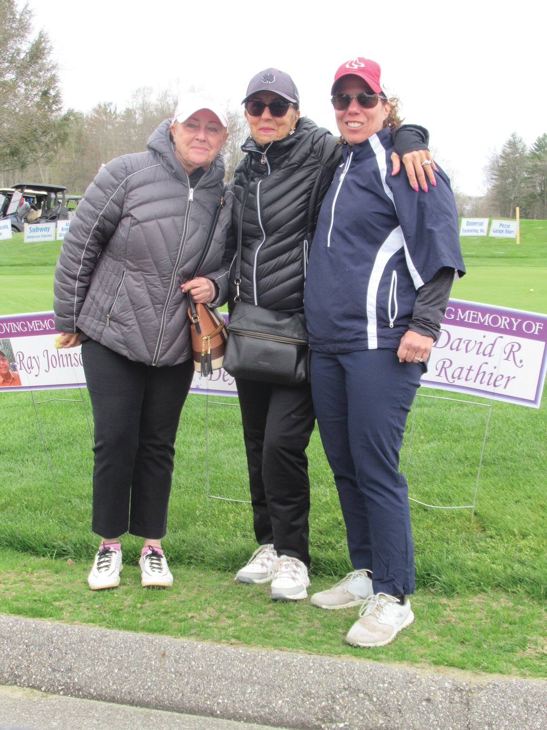 LADIES LINK: Laure Young, Valerie Money and Cathy Massemino were among the many players who were dressed for cold weather garb to play in Saturday’s 15th annual JMCE Memorial Golf Tournament at Connecticut National Golf Club in Putnam, Ct.