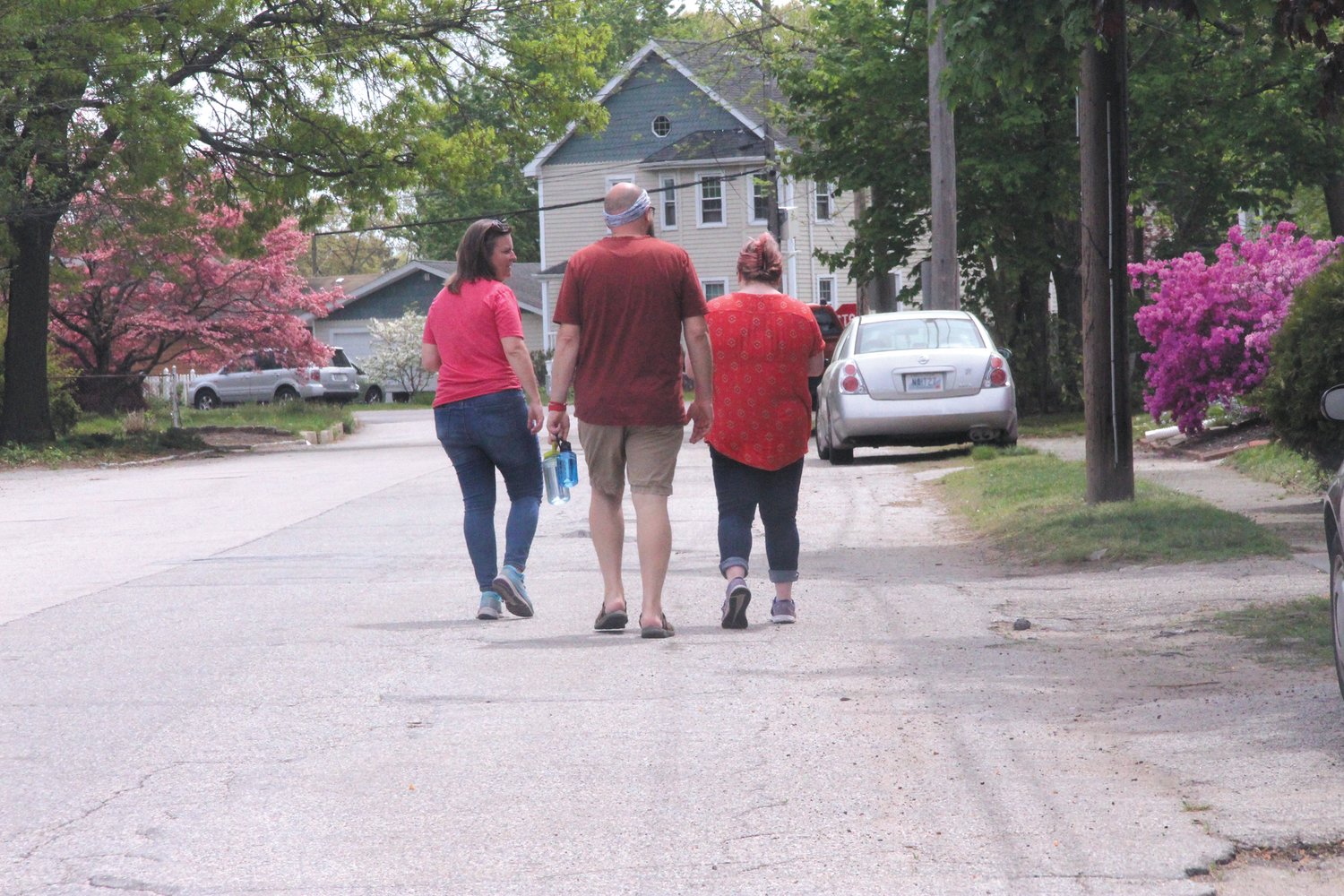 HOUSE BY HOUSE:  Candidate Fox gets a tour of Norwood from Ryan and Katie Hall.