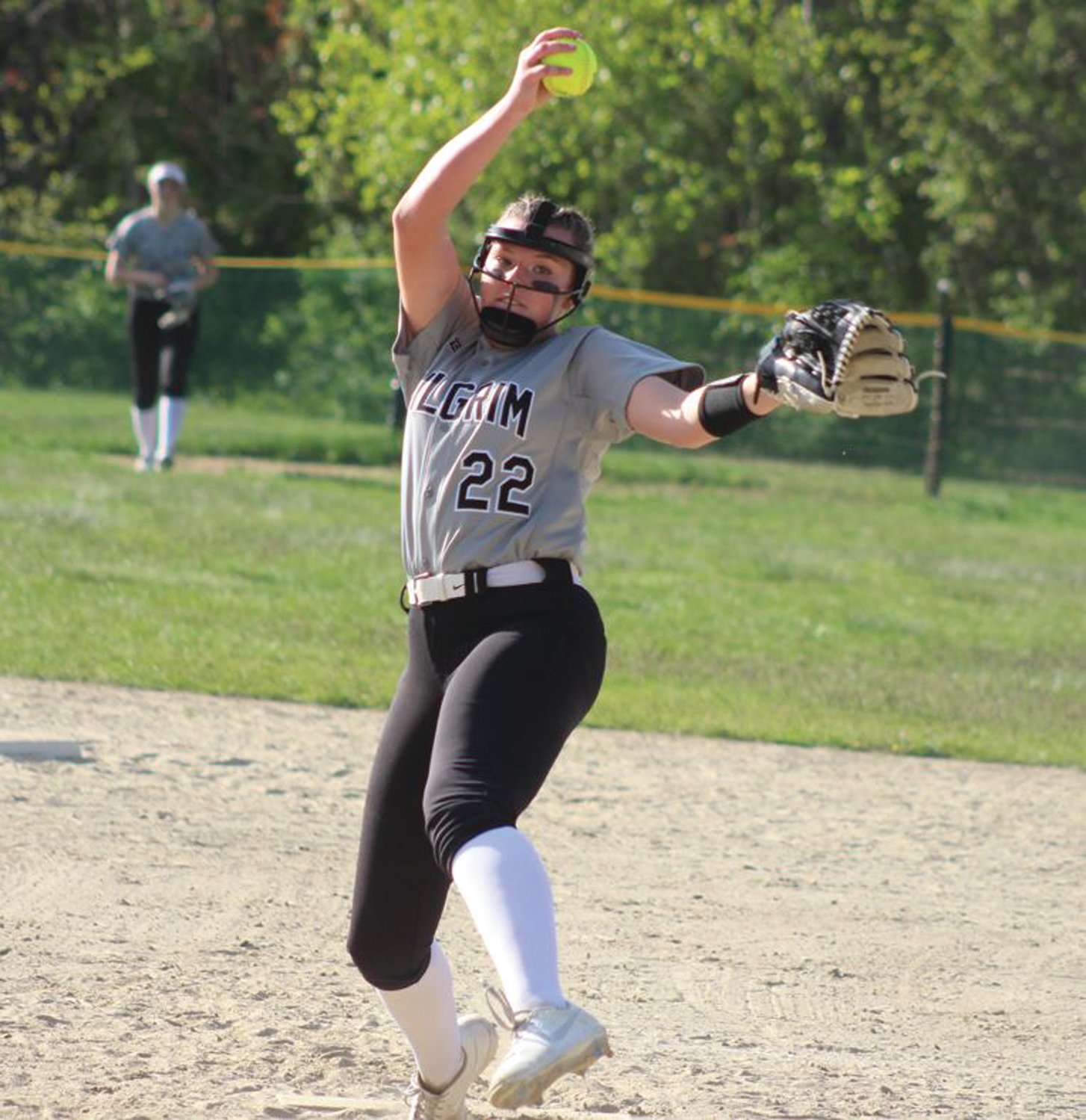 BIG WIN: Pilgrim starting pitcher Alyssa Twomey delivers a pitch against La Salle Academy last week and led the Pats to a big 10-2 win. Twomey also made an impact at the plate, hitting a two-run homer in the first inning to set the tone the rest of the way. (Photos by Alex Sponseller)