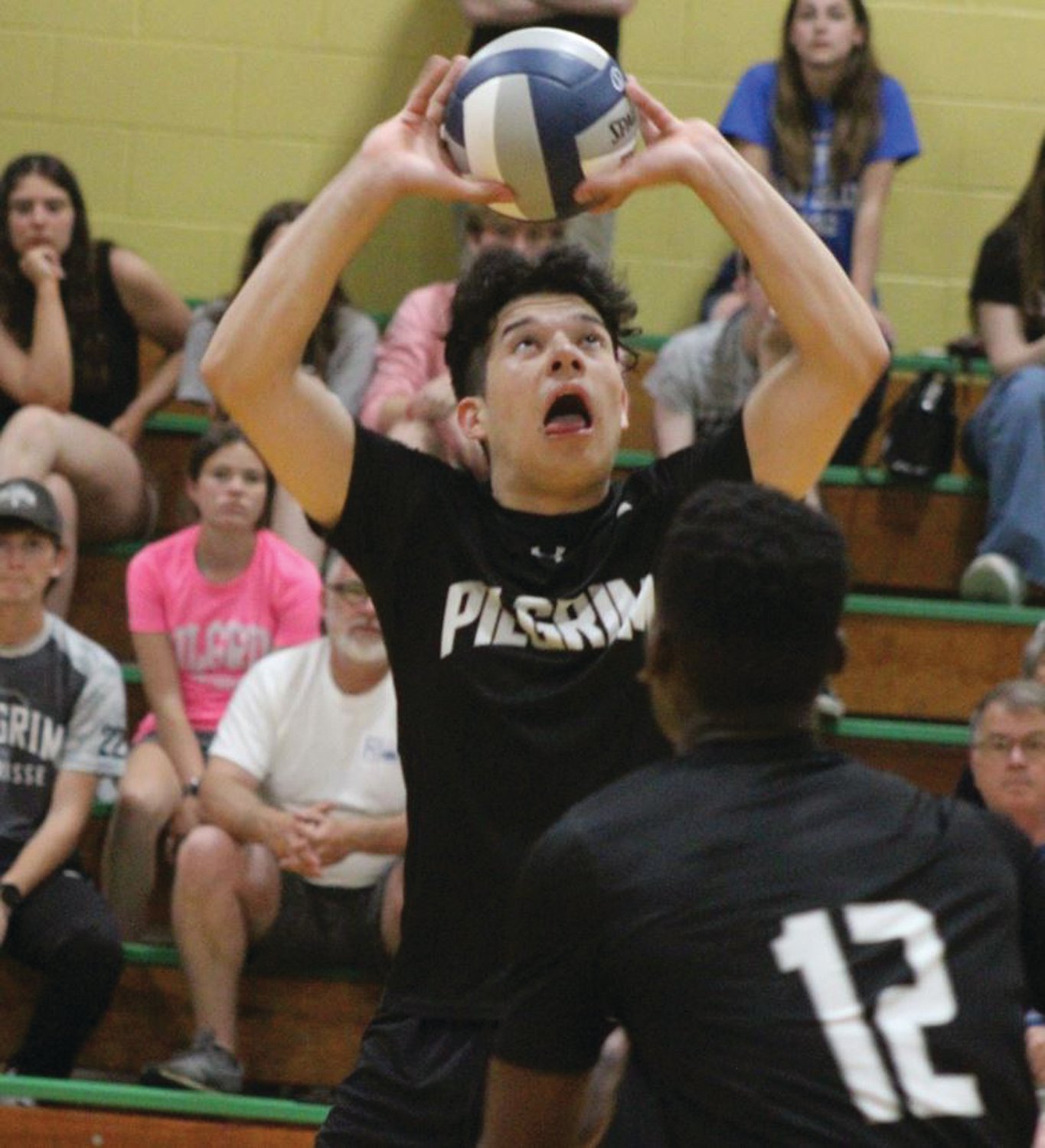 SETTING THE BALL: Azael Alvarez sets the ball at last week’s game against North Smithfield/Mount St. Charles.