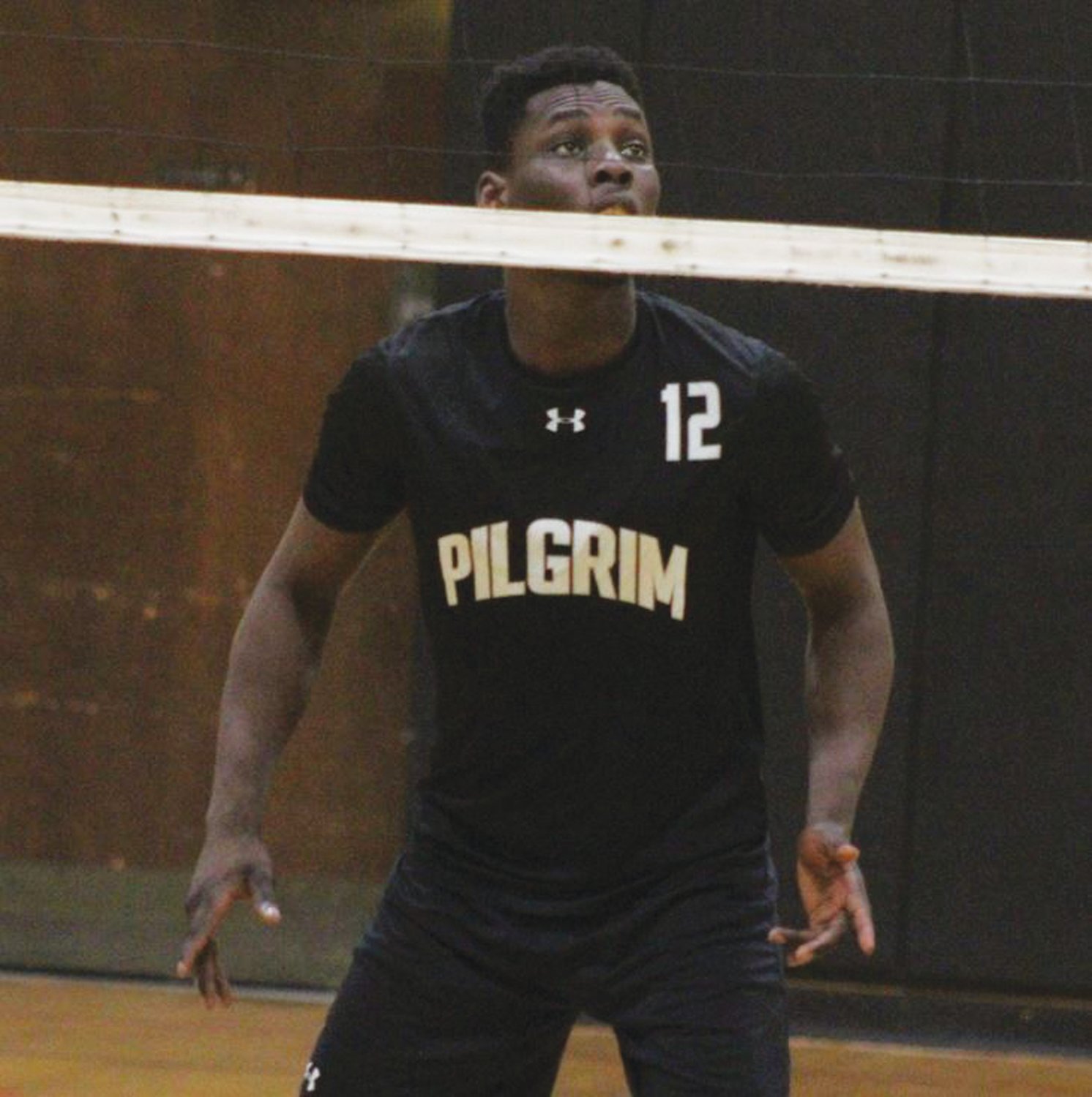 IN THE GAME: Senior volleyball player Ayo Falano at last week’s game. (Warwick Beacon photo)