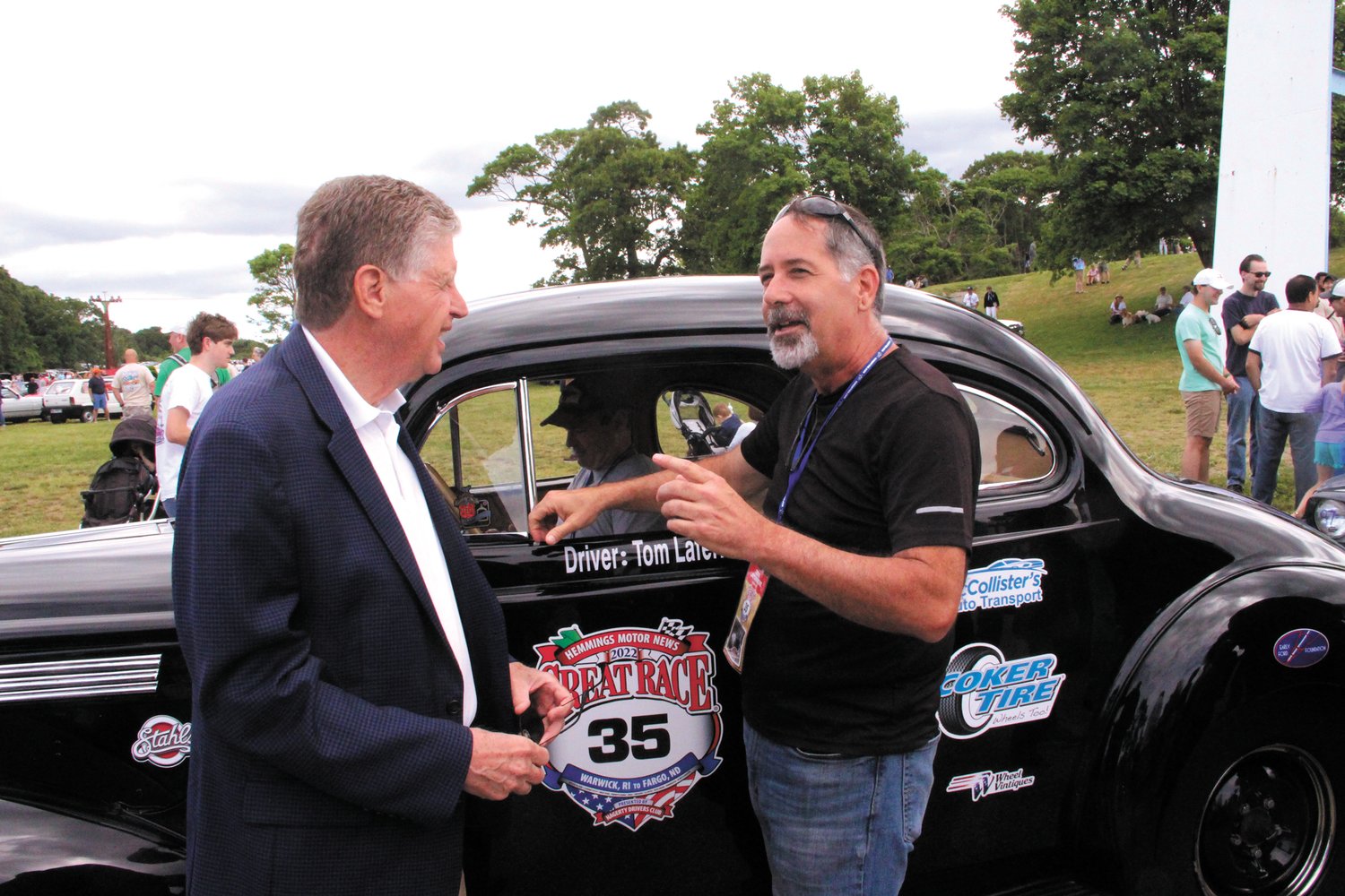 HOW IT’S DONE: Tom Laferriere of Smithfield, the only Rhode Island entrant talks about the race with Gov. Dan McKee before setting off for Fargo, ND.