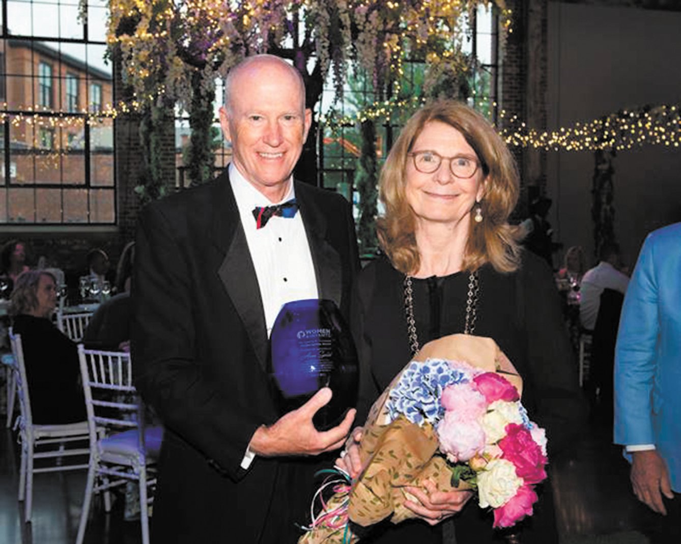 VOLUNTEER SUPPORT RECOGNIZED: Care New England Chief Philanthropy Officer, Jack Dresser and 2022 Cynthia B. Patterson Lifetime Service Award winner Anne Szostak at the 2022 Women & Infants Hospital Gala: A Celebration of Mother and Nature. (Robert Gallo Photography)
