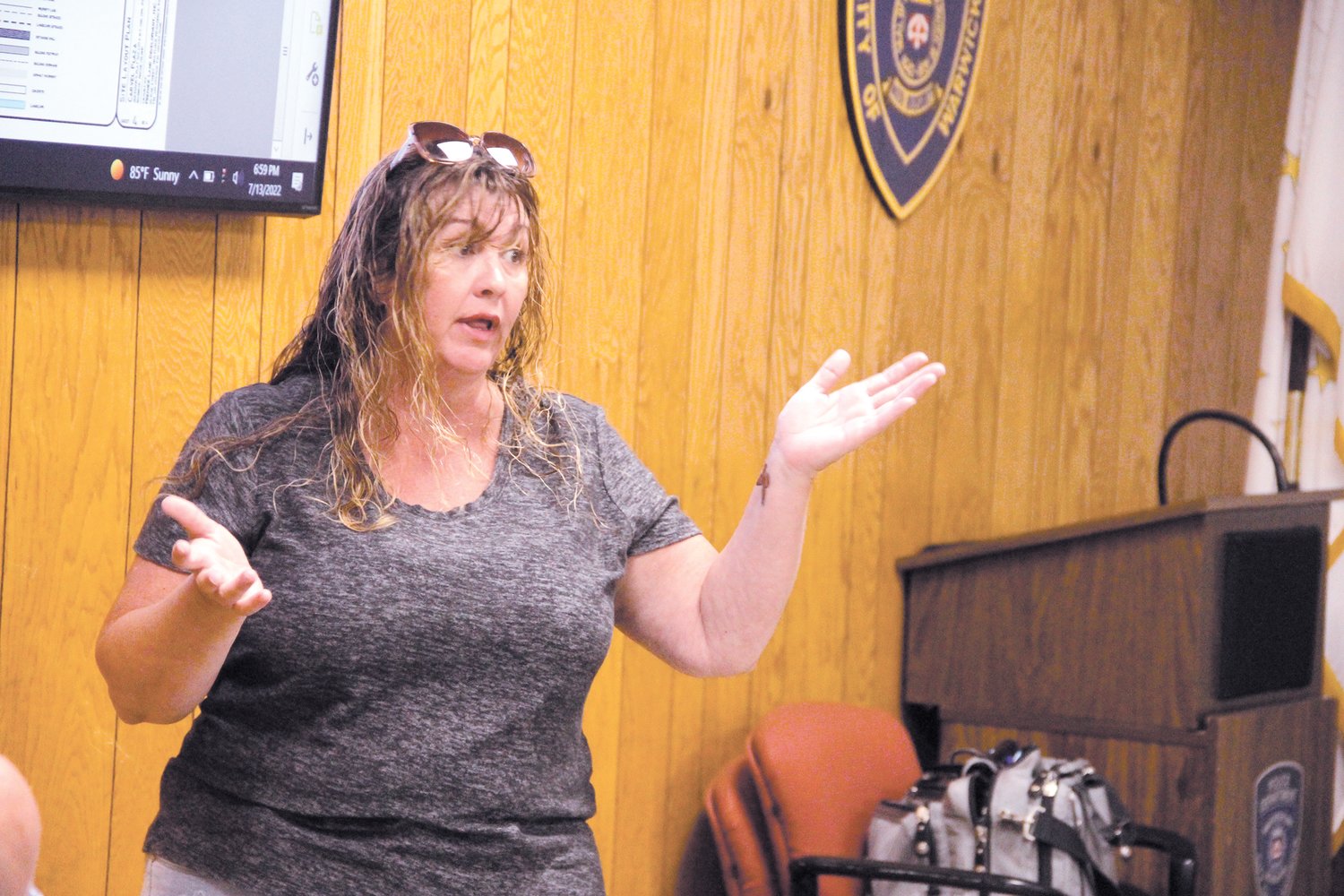 WHAT ABOUT US? After pointing to the proposed layout of Carvel Plaza, Kim Ouimette who lives on Guilford Drive questioned the traffic pattern and whether she would be looking at the back of development. (Warwick Beacon photos)