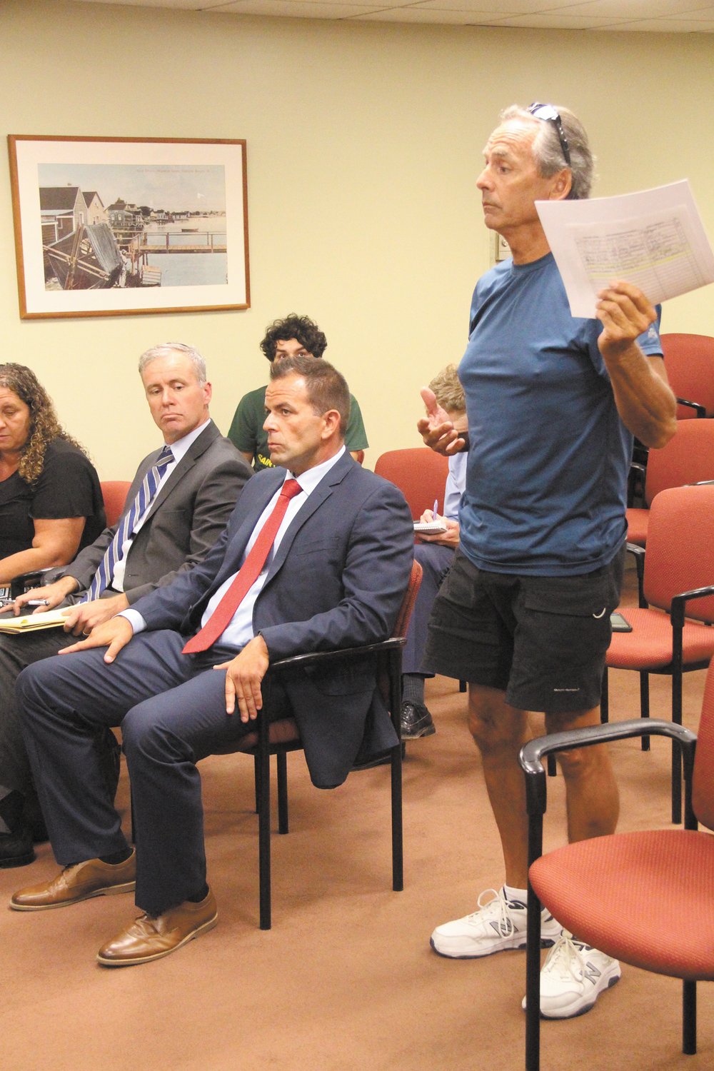 MAKING HIS CASE: Rob Cote addresses the Warwick Board of Canvassers as Senate District 29 Democratic candidate Michael Carreiro (second from left) and his attorney Christopher Friel listen. (Beacon photos)