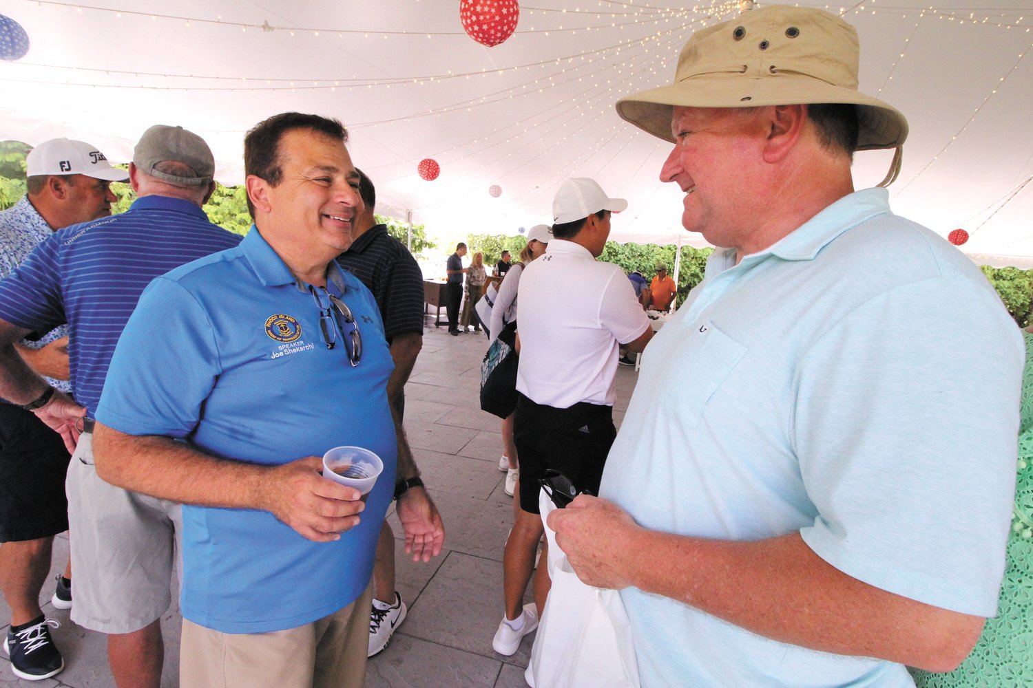 AWAY FROM THE STATE HOUSE: House Speaker K. Joseph Shekarchi and Senate Majority Leader Michael McCaffrey chat at the golf scramble benefiting Friends of the Warwick Animal Shelter and other rescue groups.