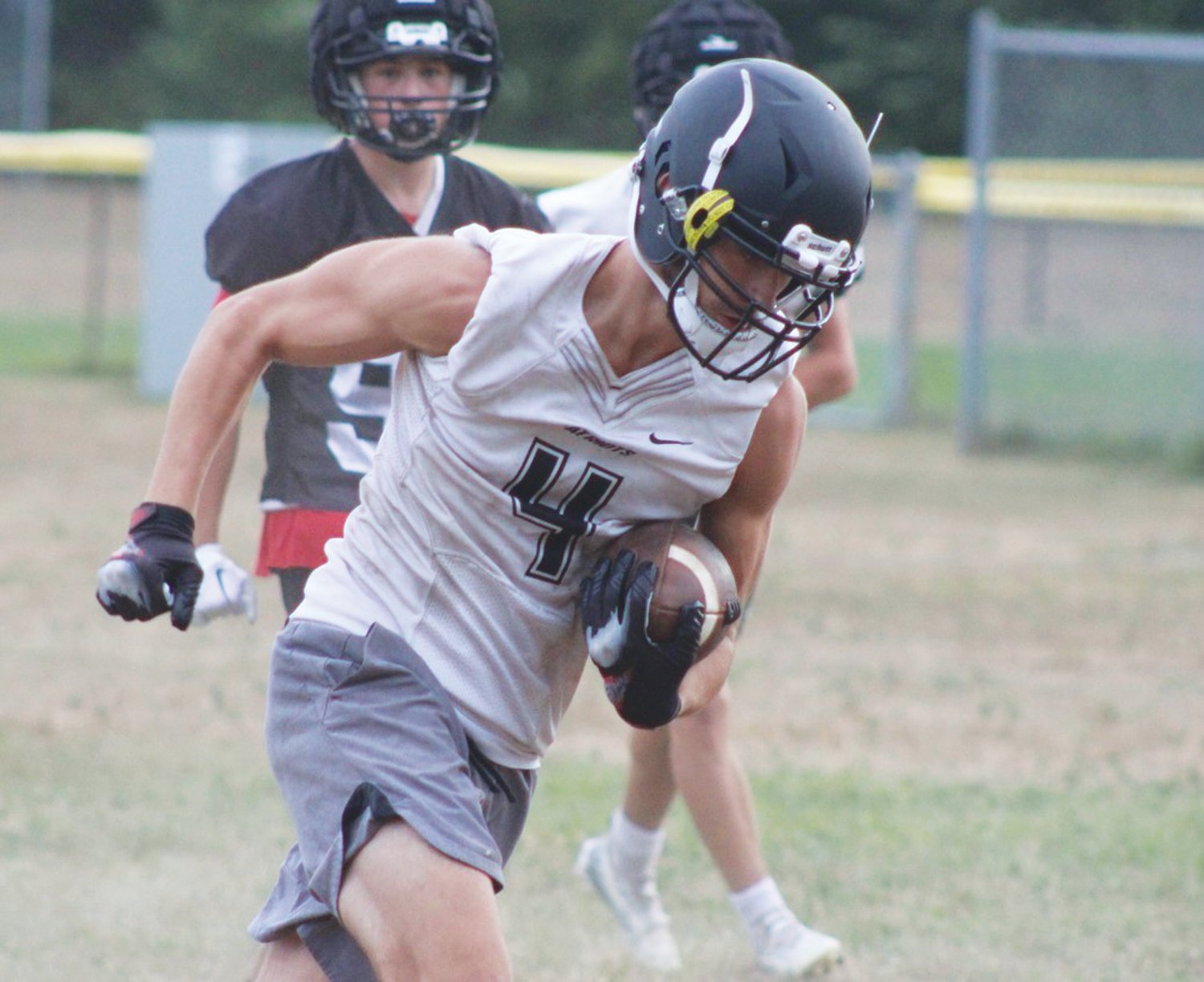 PICKING UP SOME YARDS: Cole Bigelli hauls in a pass at practice.