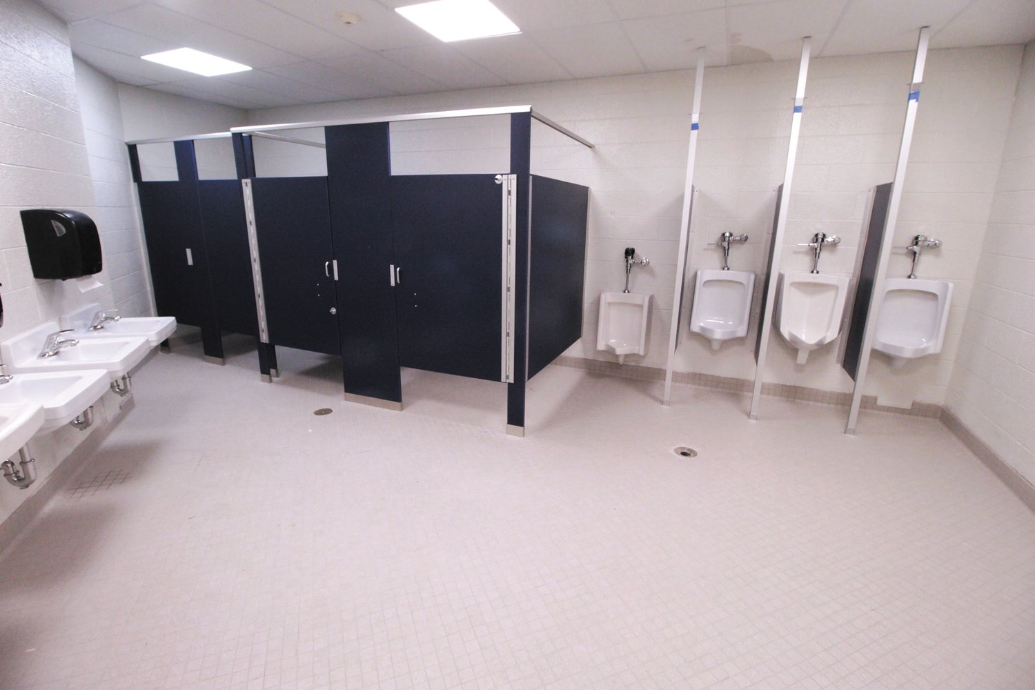 HARDLY RECOGNIZABLE: School restrooms have been outfitted with new fixtures, flooring, lighting and ceiling titles.