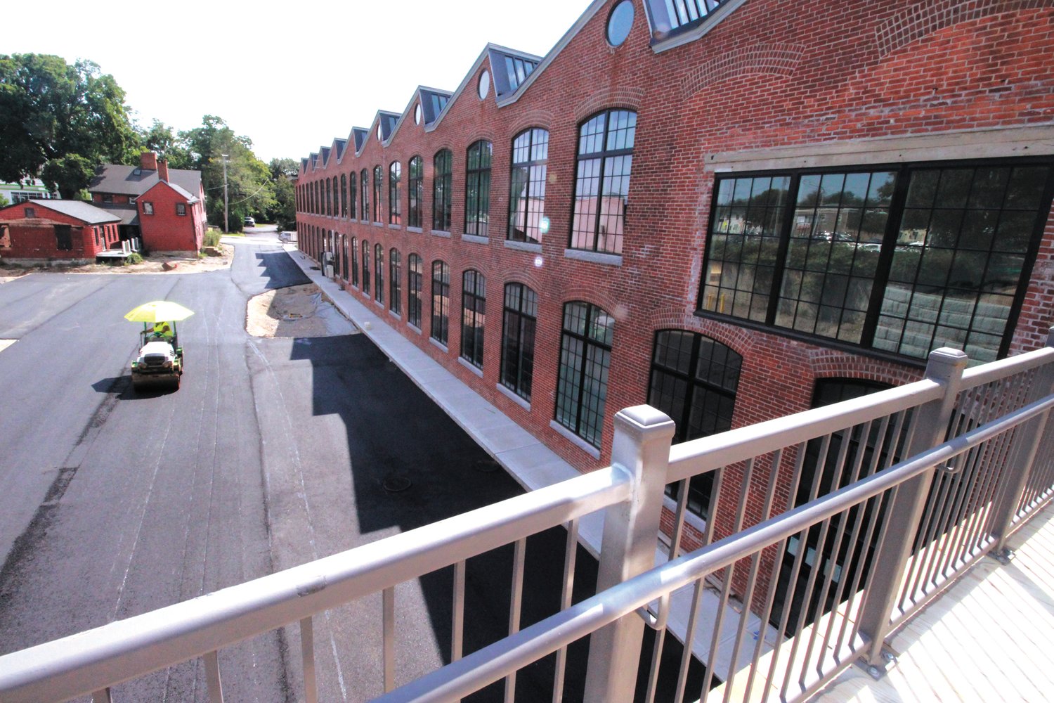 INTO THE JAWS OF THE SAW TOOTH:  A pedestrian bridge provides easy access to the second floor City Hall annex offices at the Saw Tooth Building in Apponaug.