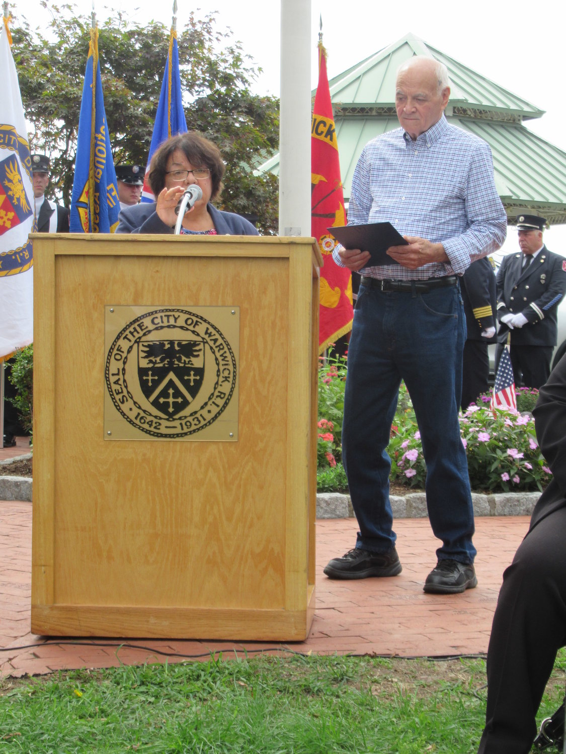 FOUNDING FATHER: Tom Isacco, who founded and maintains the 9/11 Memorial Park at Oakland Beach, was honored with a special proclamation by Warwick City Councilwoman Donna Travis during Sunday’s ceremony.
