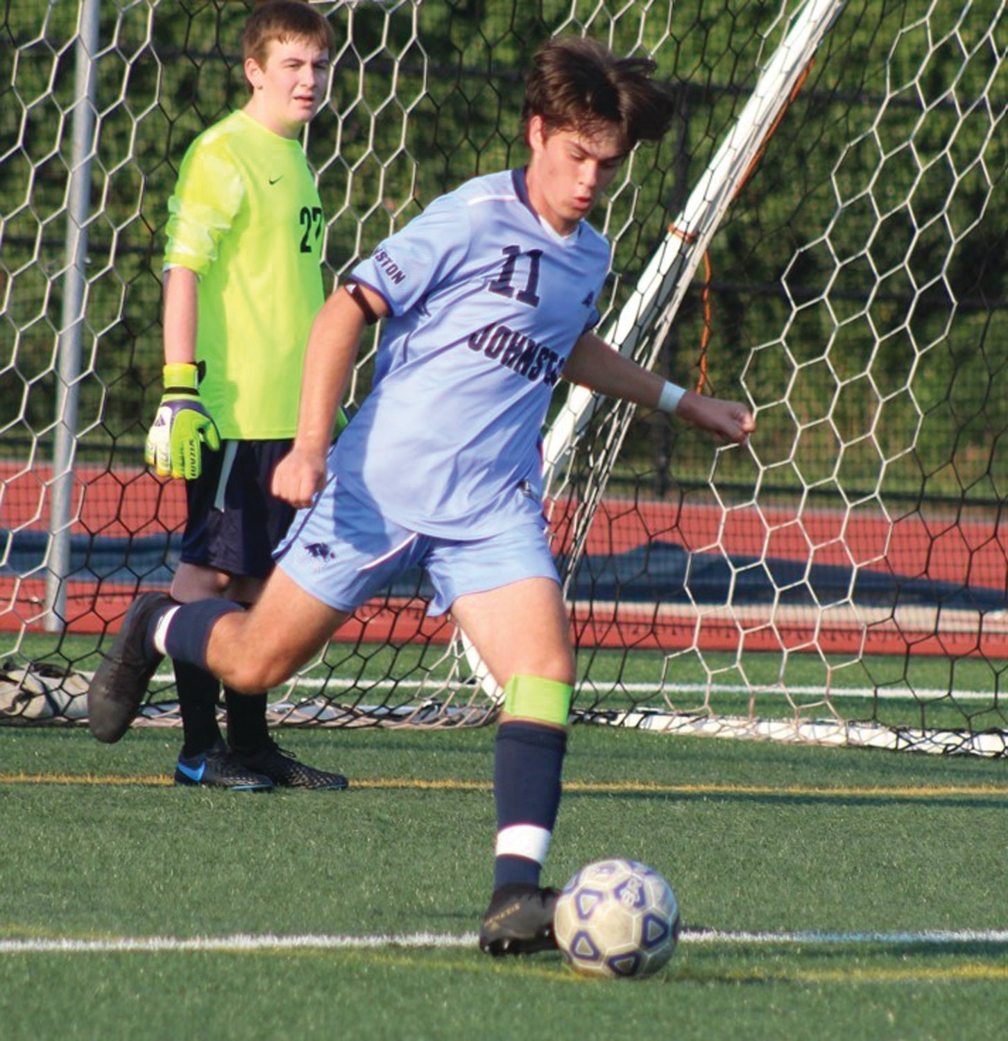 Jacob Muller boots the ball out of the zone.