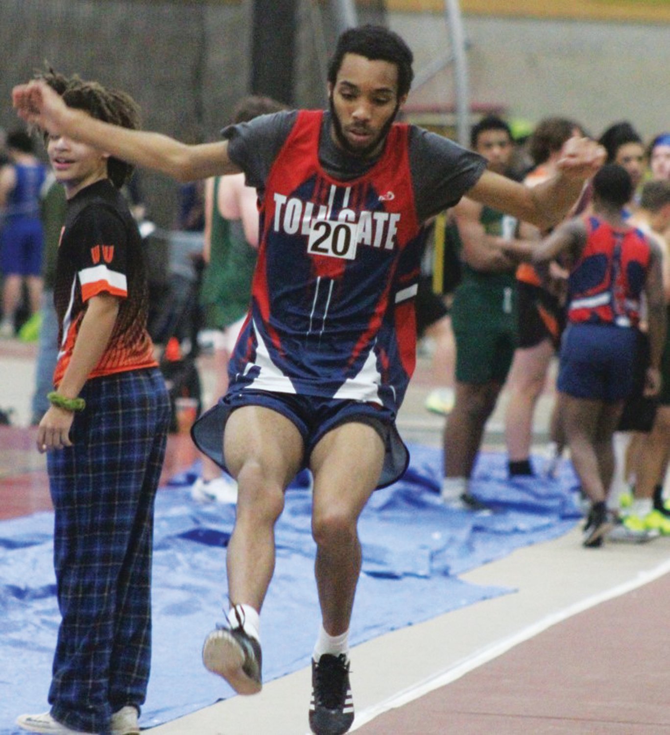 LONG JUMP: Toll Gate’s Izaiah Poston competes in the long jump last week.