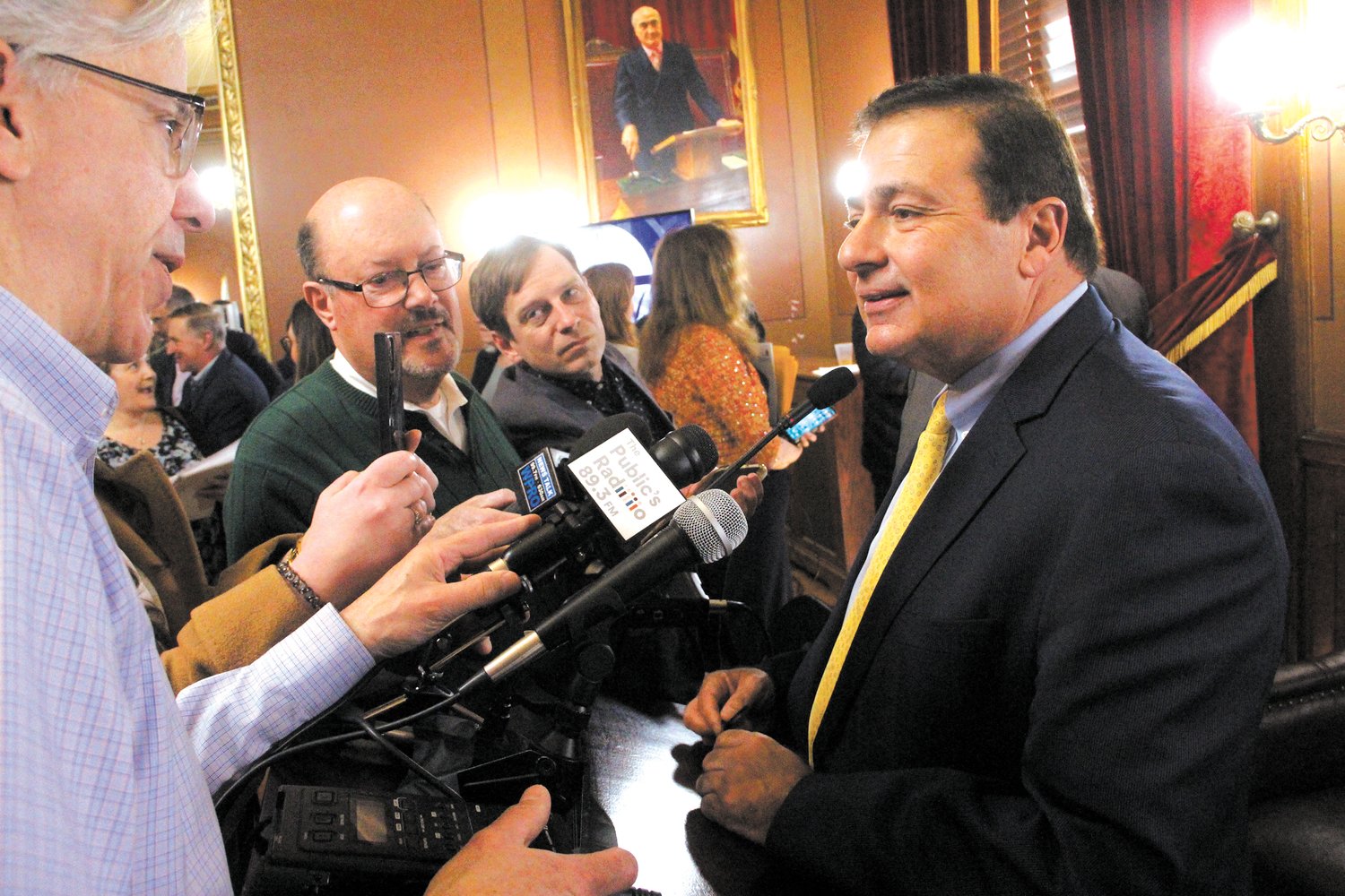 FOLLOW-UP QUESTIONS: House Speaker K. Joseph Shekarchi is surrounded by news reporters following release of the 14 bill package aimed at stimulating more affordable housing last Thursday at the State House. (Cranston Herald photo)