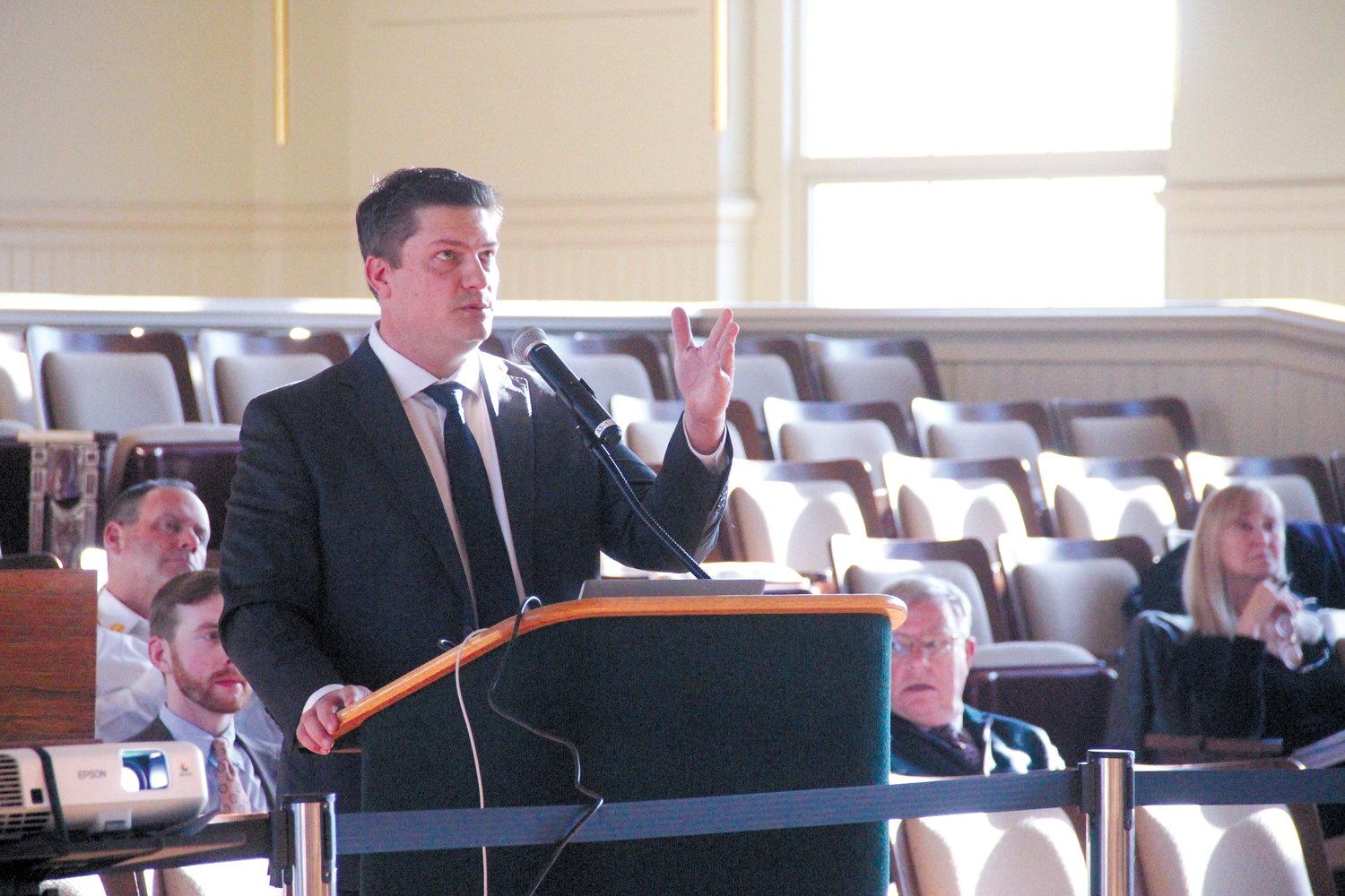 WITH A PLAN TO FUND RETIREE HEALTH CARE: Joseph Newton of GRS Consulting, the City’s actuary, outlined a 30 year plan to address $395 million in unfunded city liability to pay for retiree health care benefits. (Warwick Beacon photo)