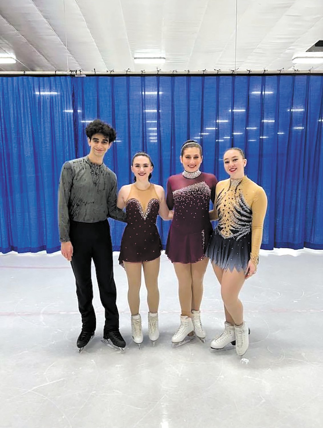 SENIOR SKATERS: Graduating Seniors take a final moment to pose for a photo op. L-R : Zachary Grant, Coco Collete, Kristen Carcieri and Johnna Eunis.