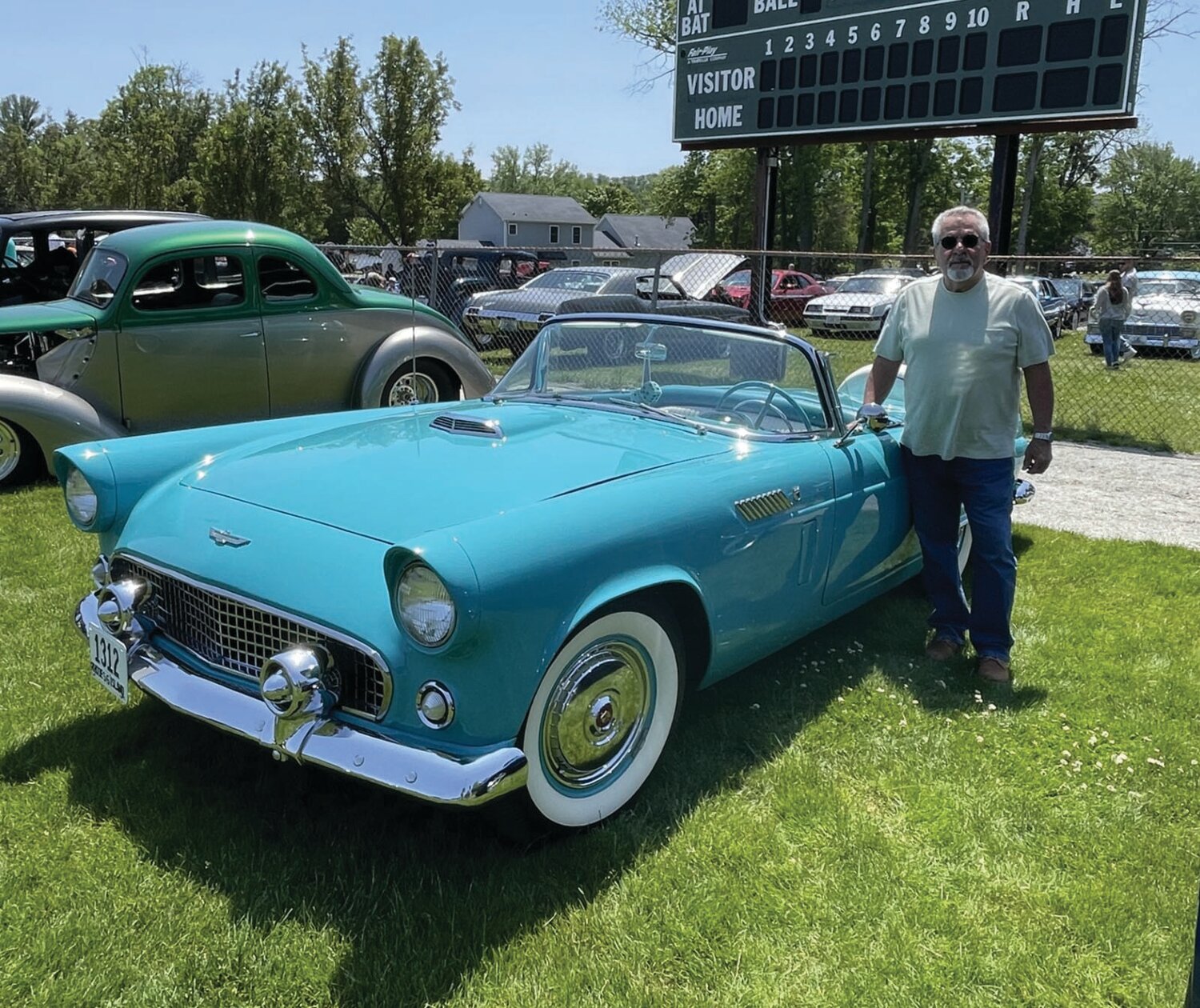 PERFECT PICK: Paul Petrozzi stands beside his 1956 peacock blue three-speed Thunderbird that features a 292 block and was voted the Coaches Pick at Monday’s Johnston Little League Car Show.