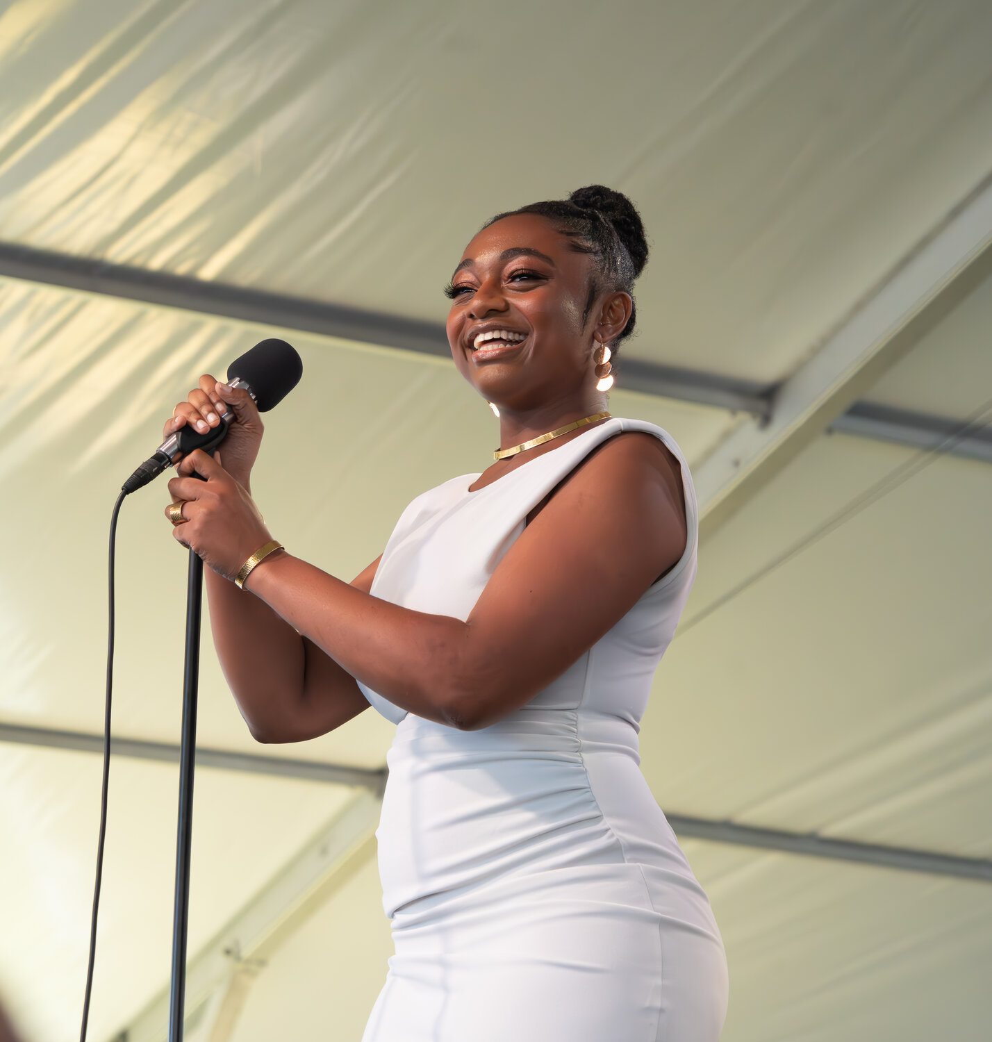 GRAMMY-winning Jazz vocalist Samara Joy, 23, opens her set with a smile at the Newport Jazz Festival on Sunday, August 6. This is Samara's second appearance at the Jazz Festival.