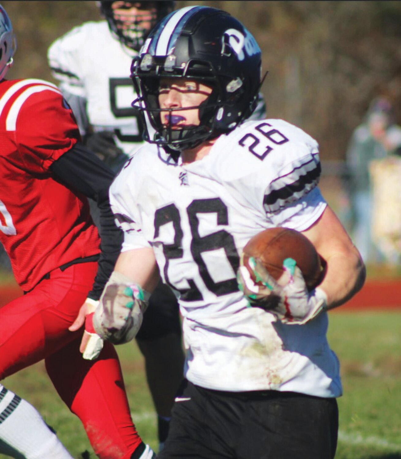 UP THE GUT: Pilgrim’s Tristan Miller rushes the ball.