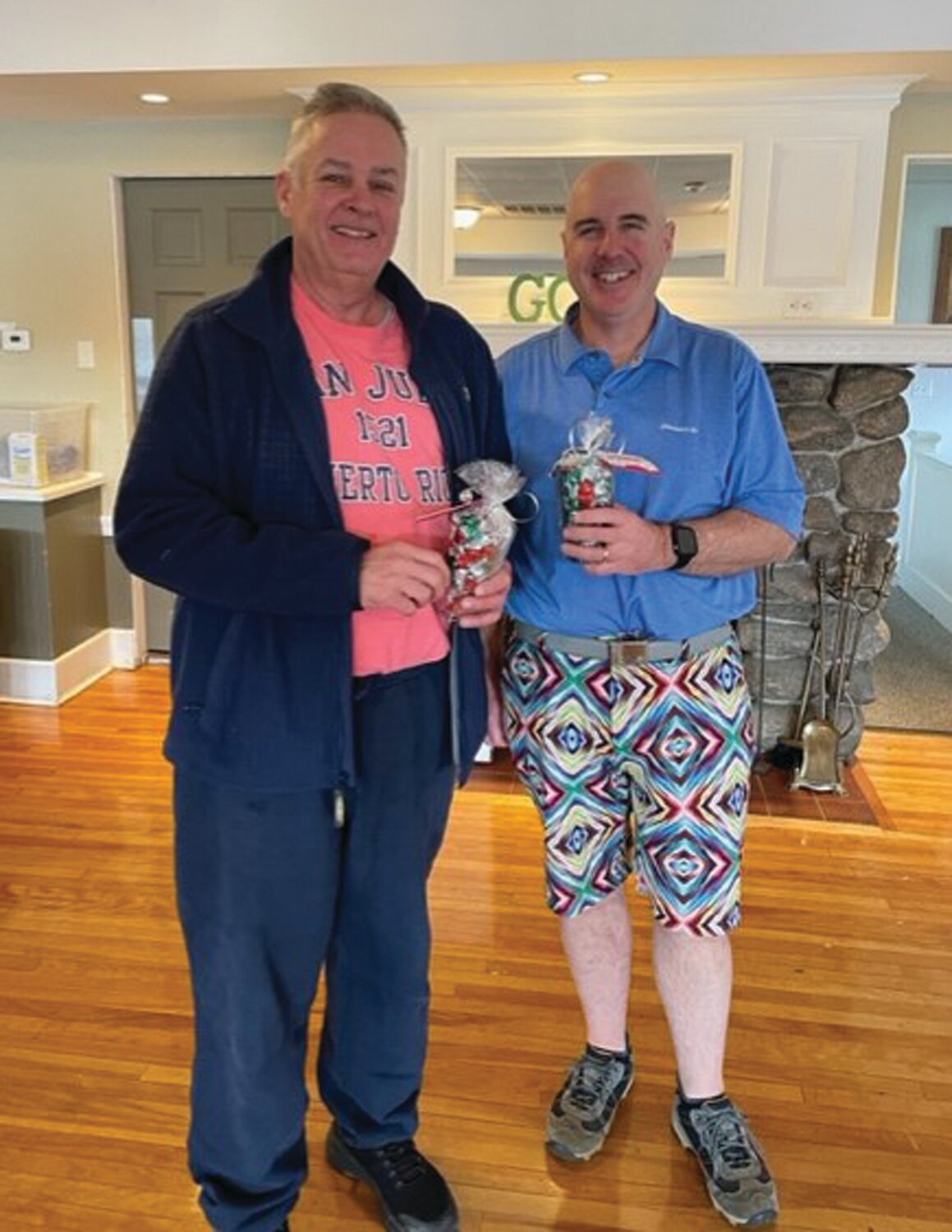 CHAMP’S CORNER: Chris Dumas and Walter Geer are all smiles after winning the 8th annual Polar Golf Tournament at Glocester Country Club.